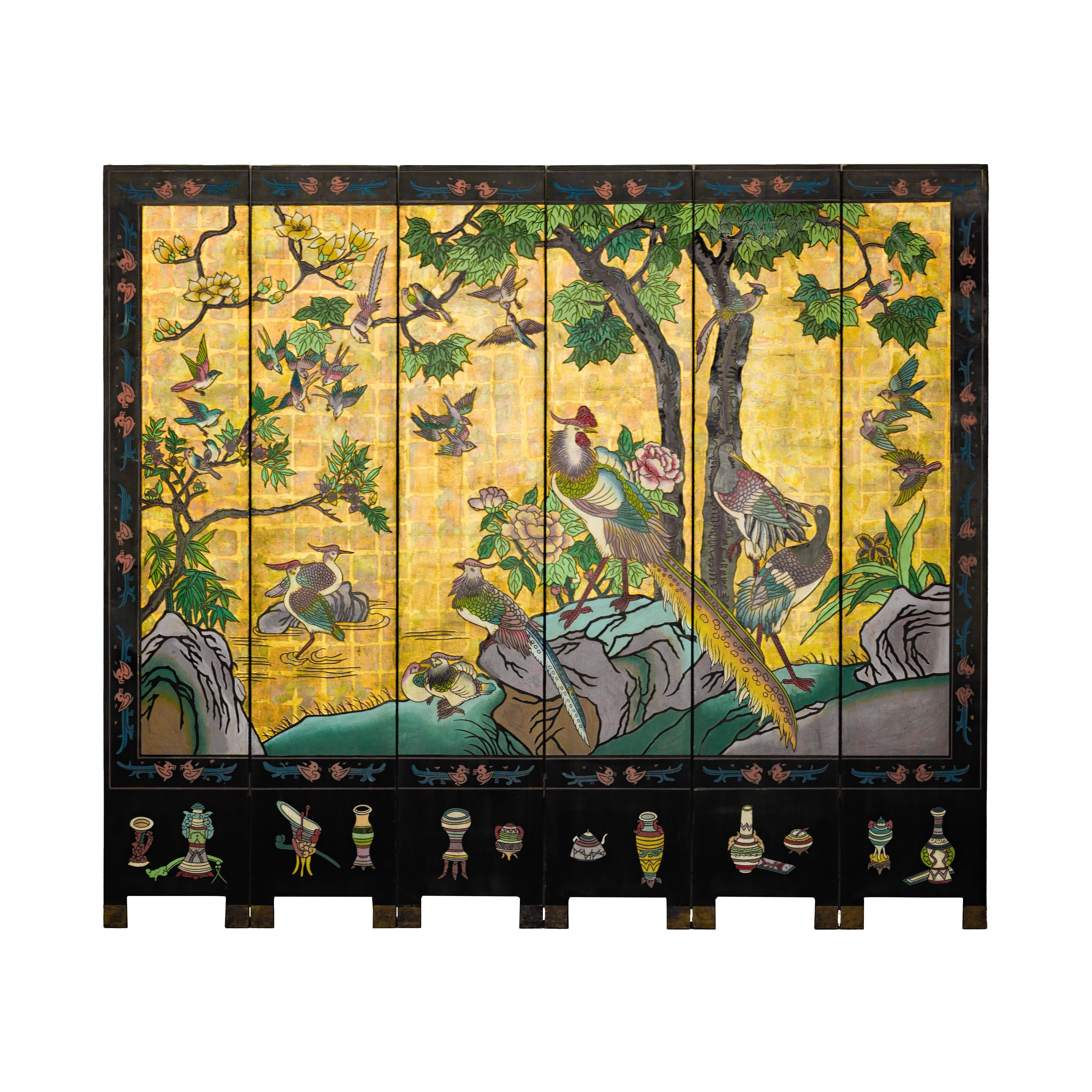 A Midcentury Chinese six-panel gold and black screen with bird, floral and tree motifs. This vintage Midcentury six-panel screen is a stunning blend of artistry and functionality. The front showcases an intricate tableau of birds, flowers, and
