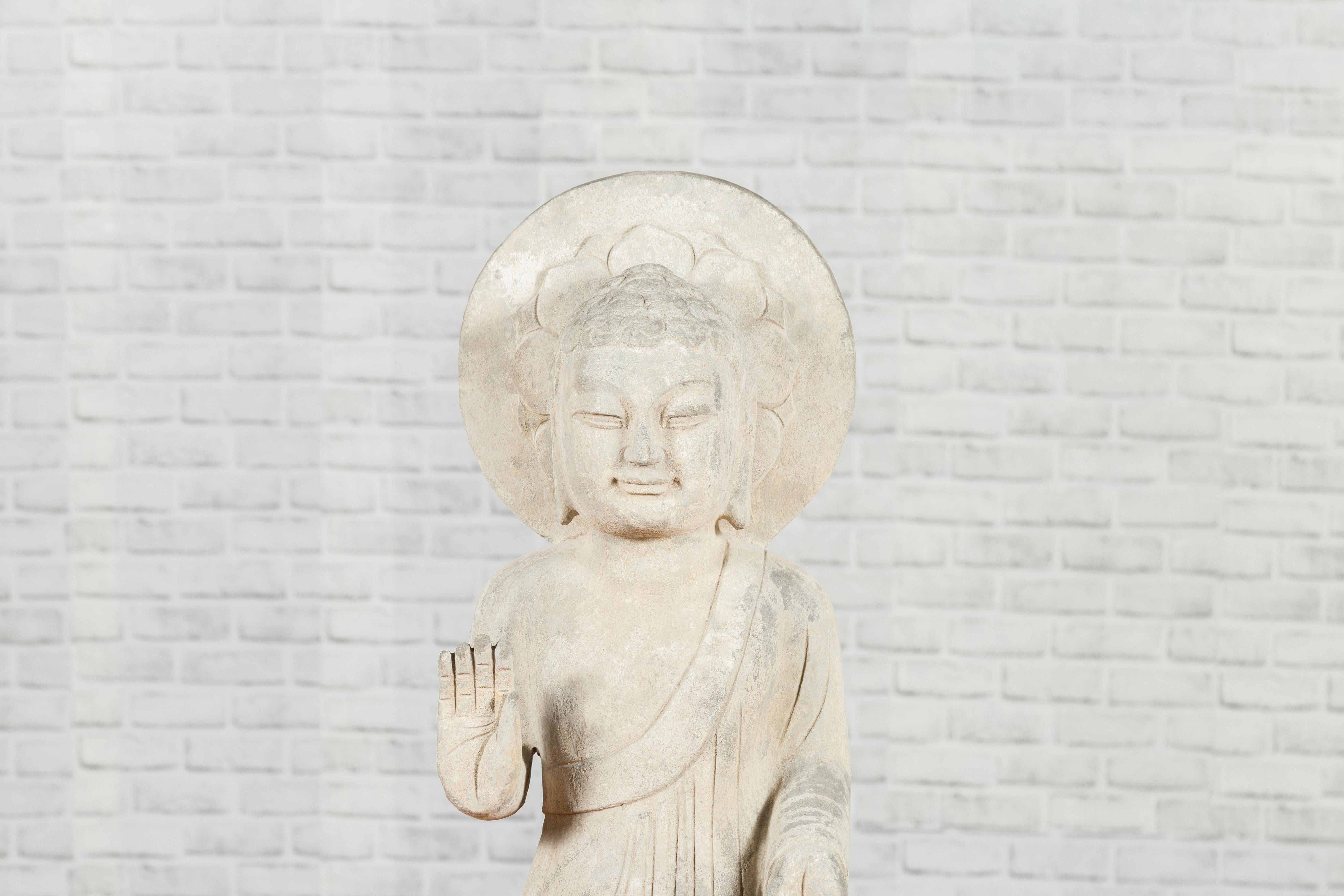 Carved Vintage Chinese Stone Standing Buddha with Abhayamudrā Gesture of Fearlessness
