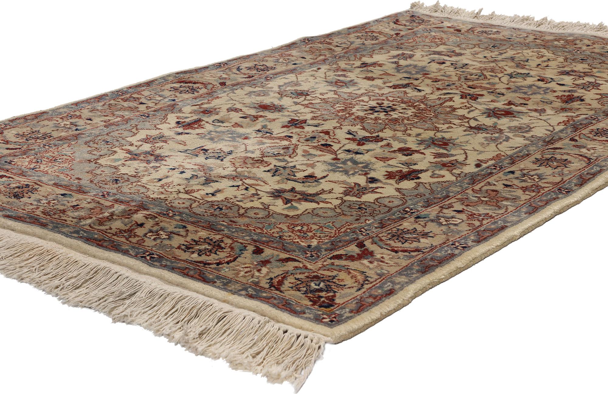 78694 Vintage Beige Chinese Tabriz Rug, 03'01 x 05'01. Introducing a timeless masterpiece of craftsmanship, this small vintage Chinese Tabriz rug embodies classic elegance with its hand-knotted wool construction. The focal point of this exquisite