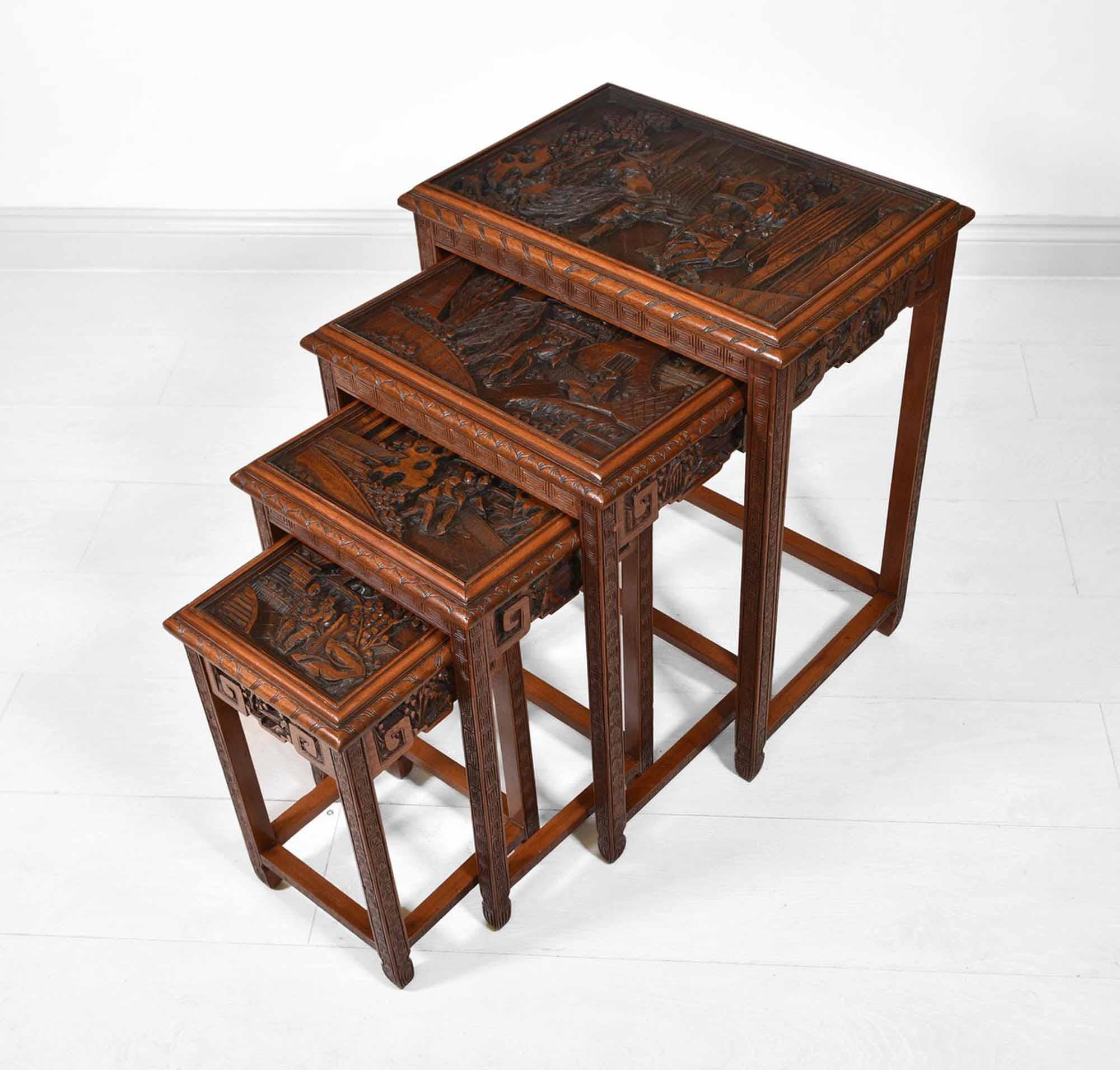 Hand-Carved Vintage Chinese Teak Carved Quartetto Nest of Four Tables with Drawer