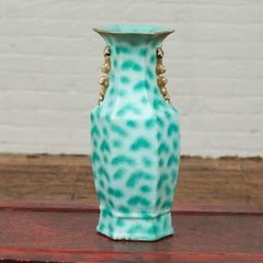 Vase turquoise vintage avec motif tacheté et col hexagonal