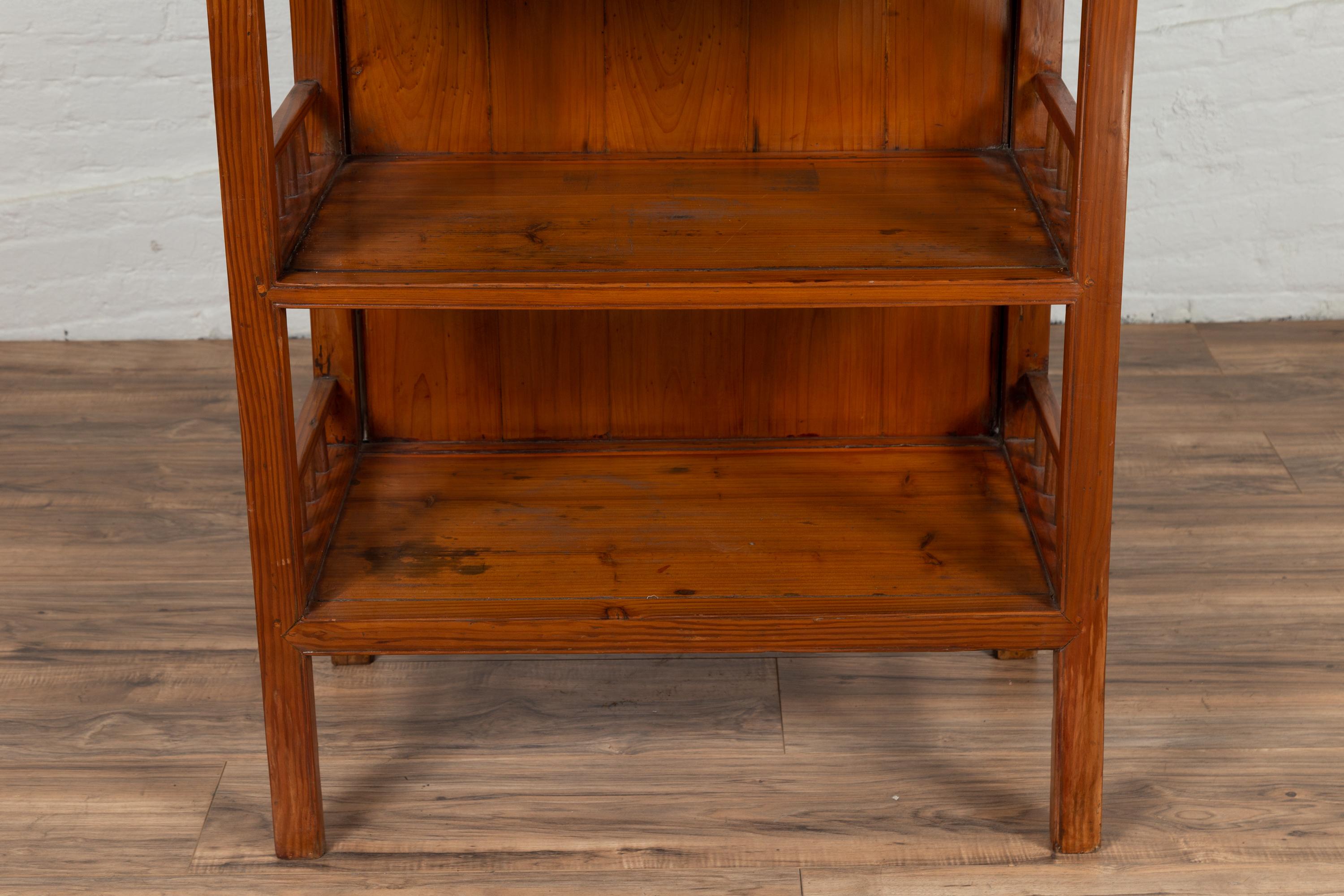 Vintage Chinese Two-Part Elmwood Bookcase with Pillar-Shaped Strut Motifs 1