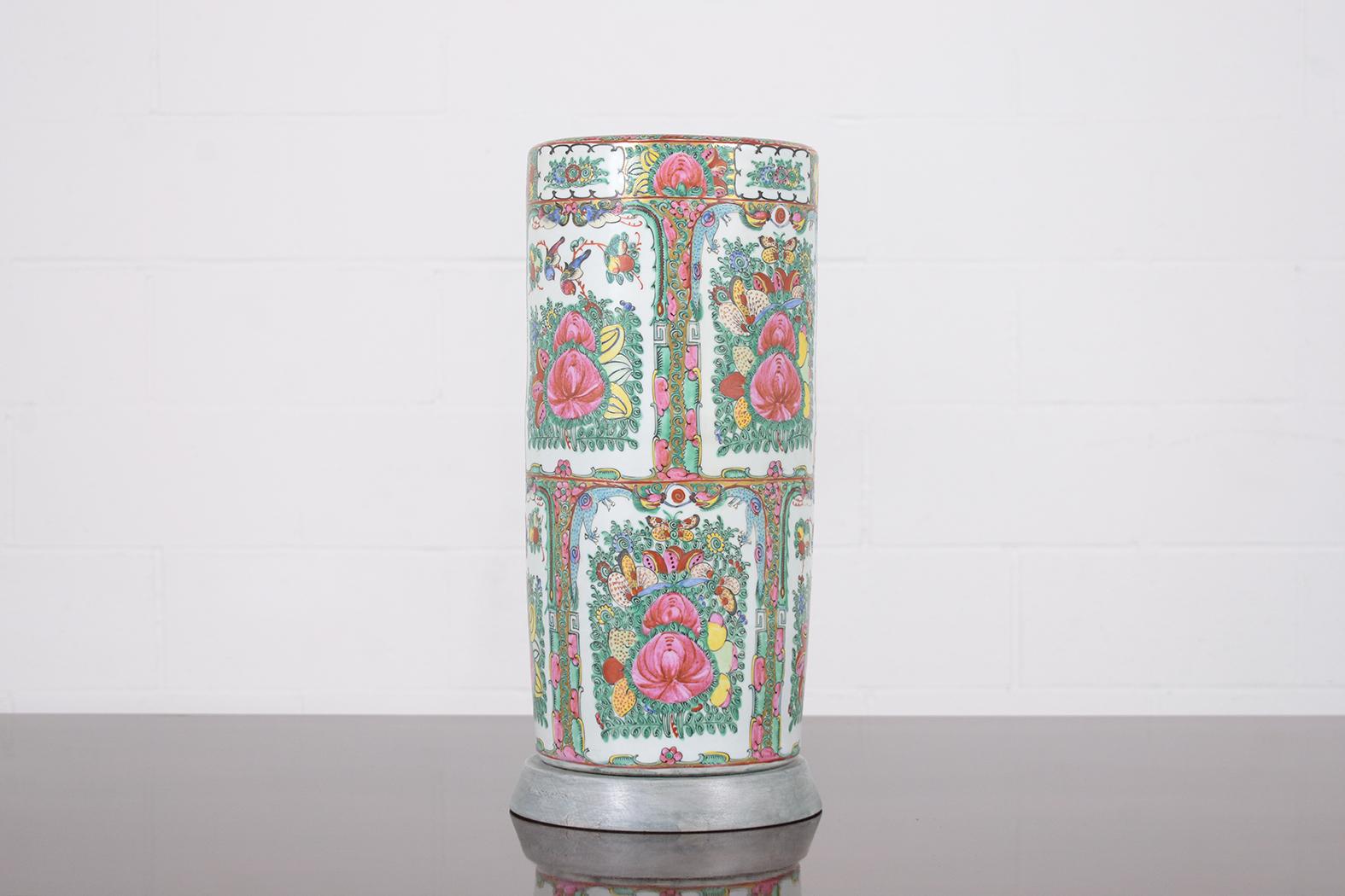 Embrace the timeless allure of our extraordinary vintage Chinese umbrella stand, meticulously crafted from porcelain and in excellent condition, never broken or repaired. This captivating vintage porcelain piece showcases a cylindrical shape,
