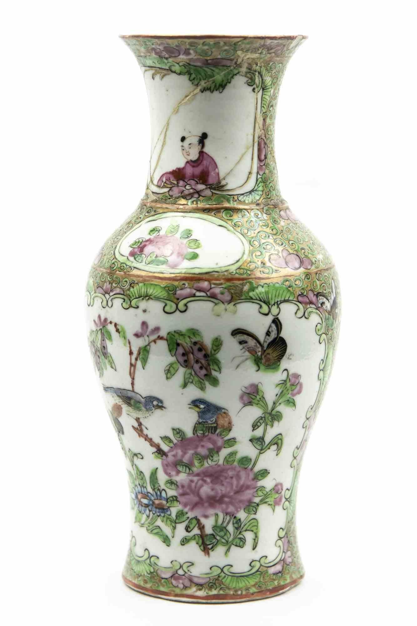 Chinese Vase is an original Modern object realized in the Early 20th Century.

Original colored ceramics. 

Beautiful object realized with original white ceramics with vegetable and oriental scene. The colors are delicate and there are golden