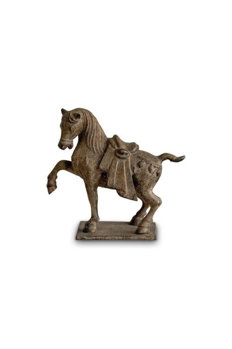 This Vintage Chinese War Horse Statue, cast in iron using techniques reminiscent of the Tang Dynasty, showcases the enduring legacy of ancient Chinese artistry. The Tang Dynasty, known for its cultural flourishing and military prowess, produced