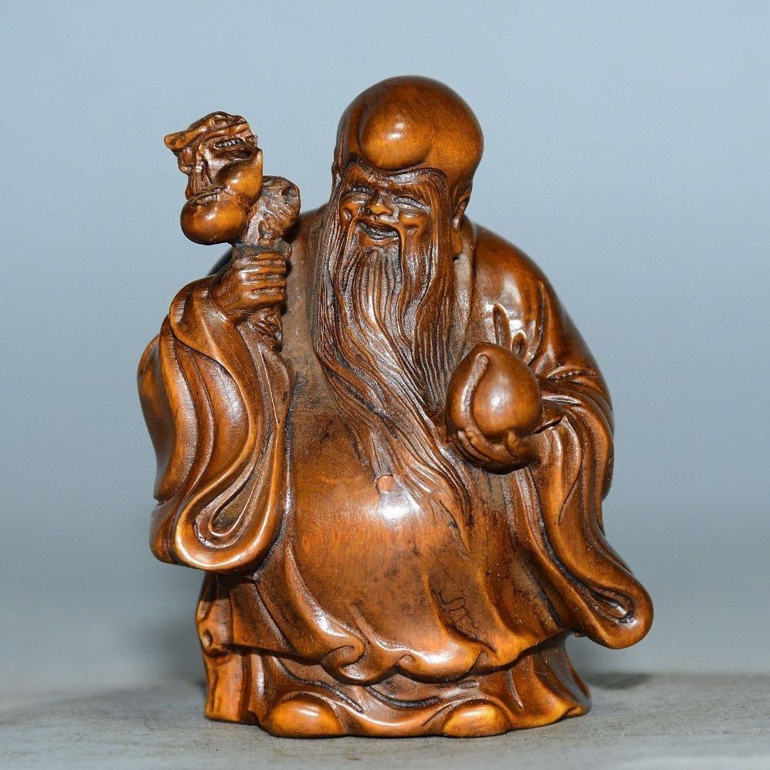 Vintage Chinese Wood Carving Longevity Gott Statue - Handcrafted Shou Xing Figur für Segen und langes Leben

Diese Vintage Chinese Wood Carving Statue stellt Shou Xing (寿星) dar, den verehrten Gott der Langlebigkeit in der traditionellen chinesischen