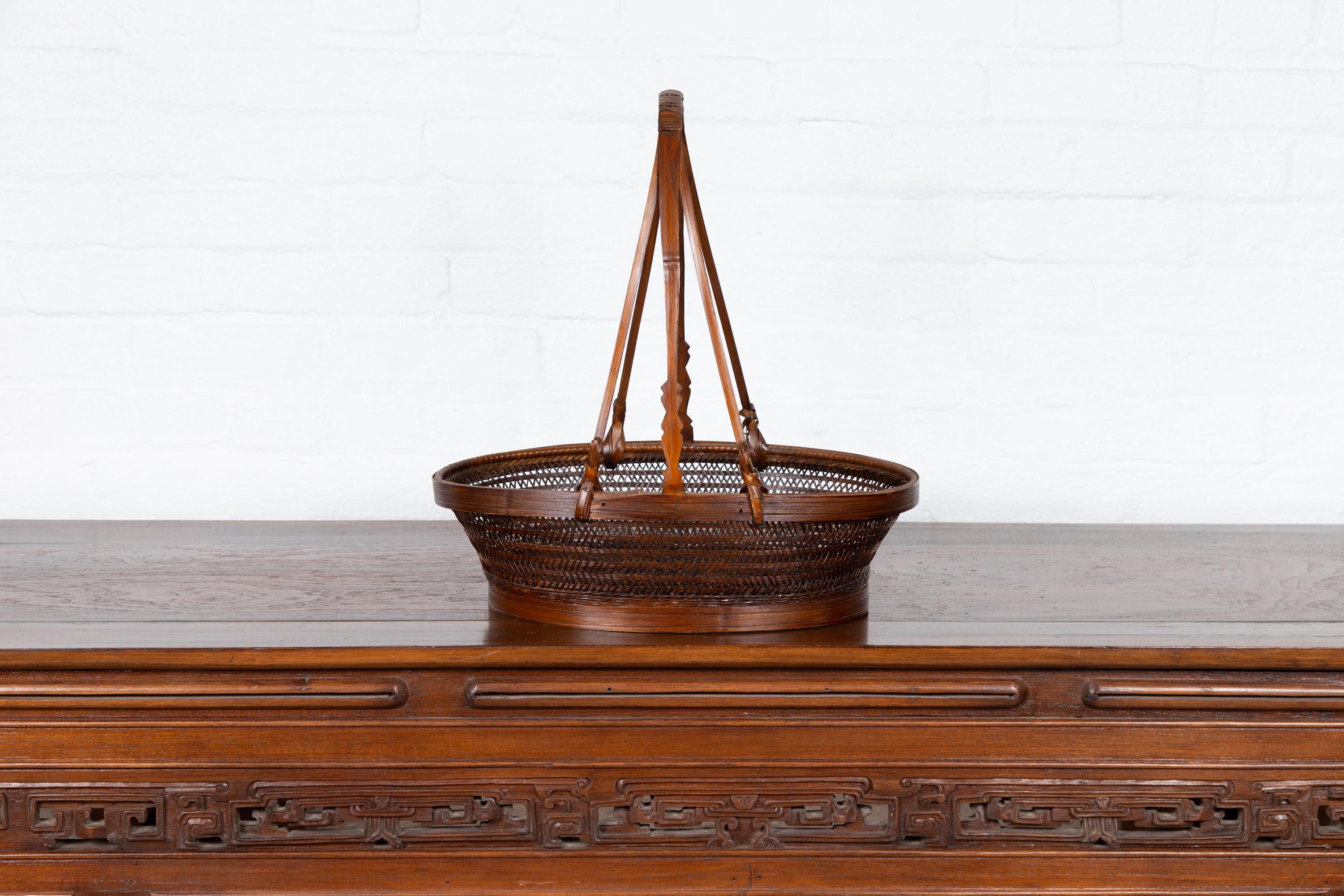 Vintage Woven Rattan Carrying Basket with Large Tripartite Handle For Sale 2