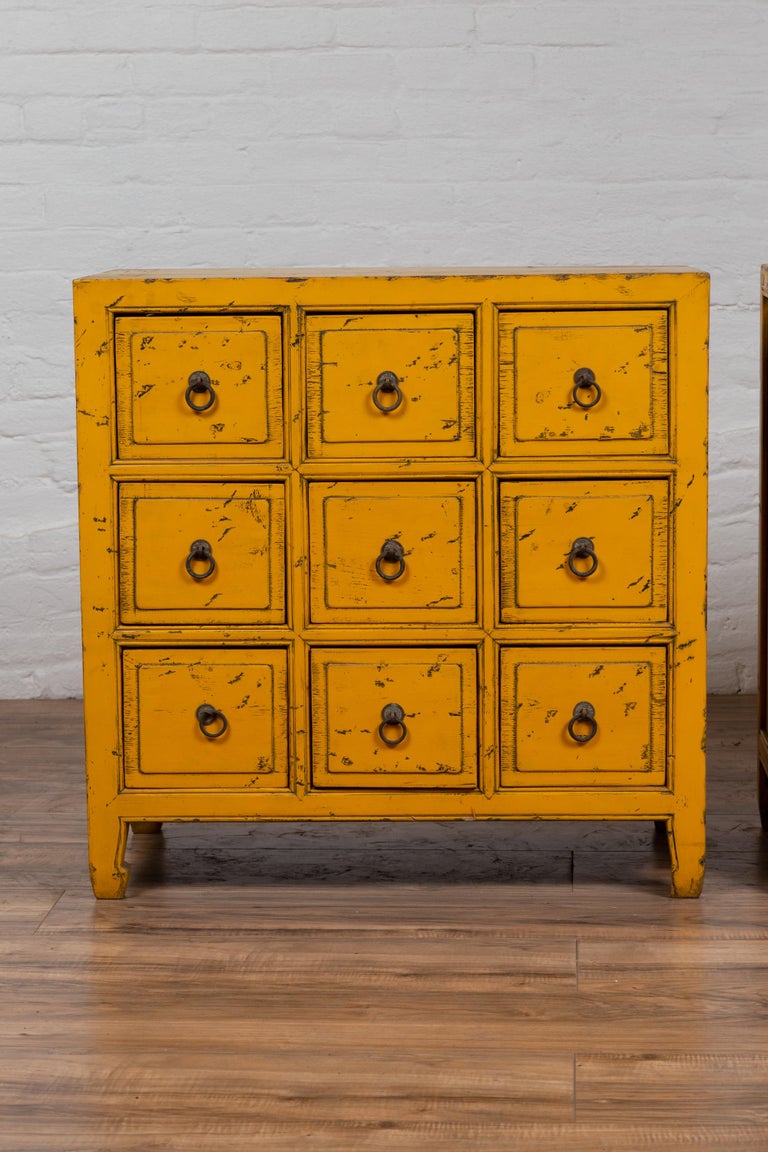 Vintage Chinese YellowPainted NineDrawer Apothecary Chests with Black