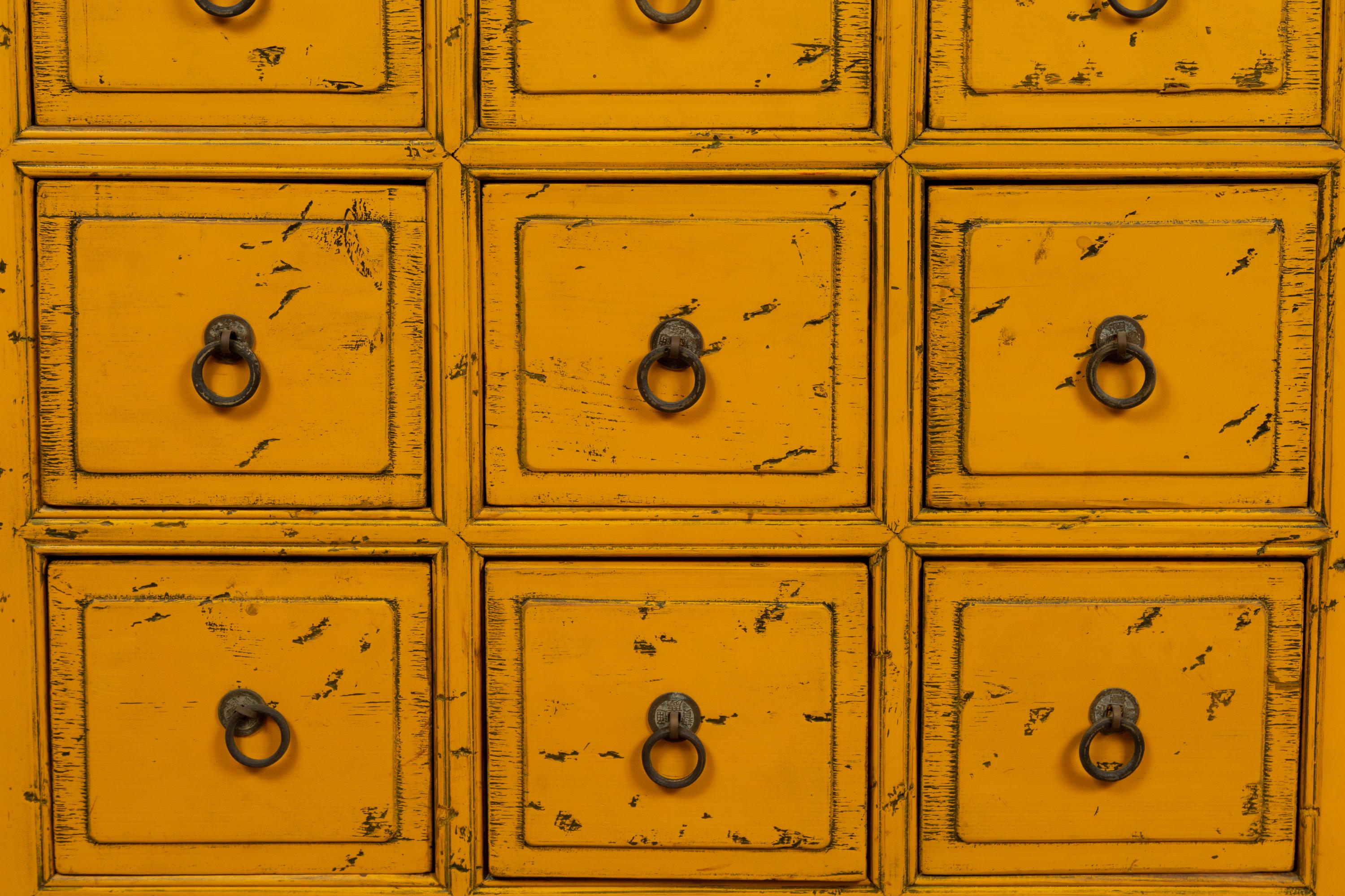 Vintage Chinese Yellow-Painted Nine-Drawer Apothecary Chests with Black Splatter In Good Condition In Yonkers, NY