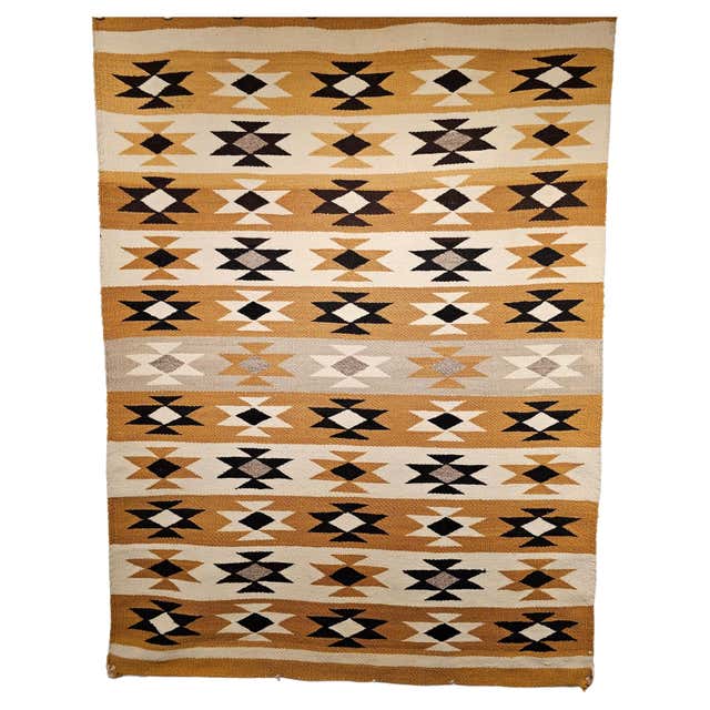 Vintage Native American Navajo Rug In A Geometric Pattern In Earth Tone vintage-native-american-navajo-rug-in-a-geometric-pattern-in-earth-tone