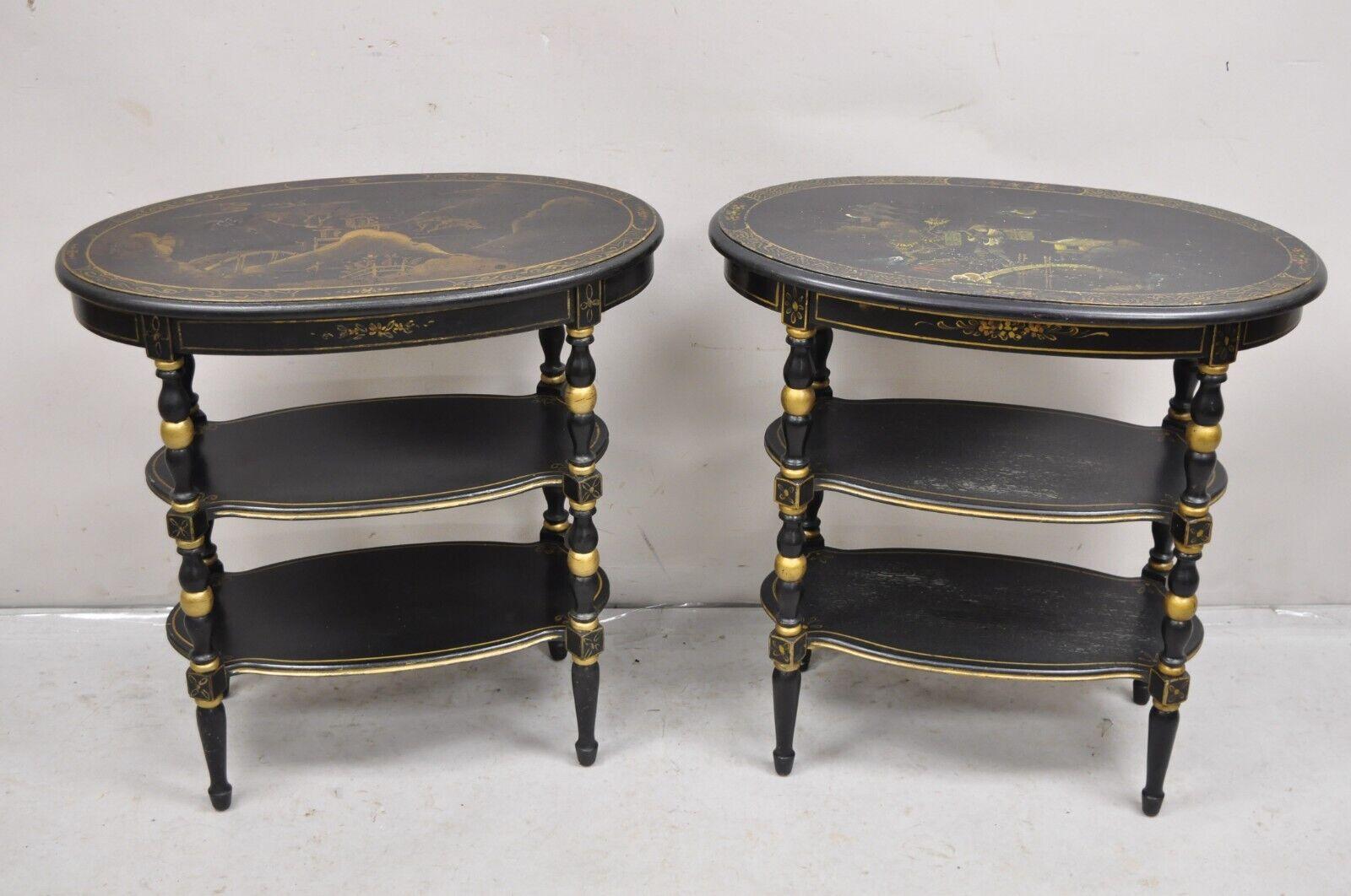 Vintage Chinoiserie Black Painted Oval 3 Tier Side Tables by Yeager - a Pair. Item features beautiful hand painted scenes to tops, gold gilt accents, original label, very unique vintage tables. Circa Early 20th Century. Measurements: 26.5