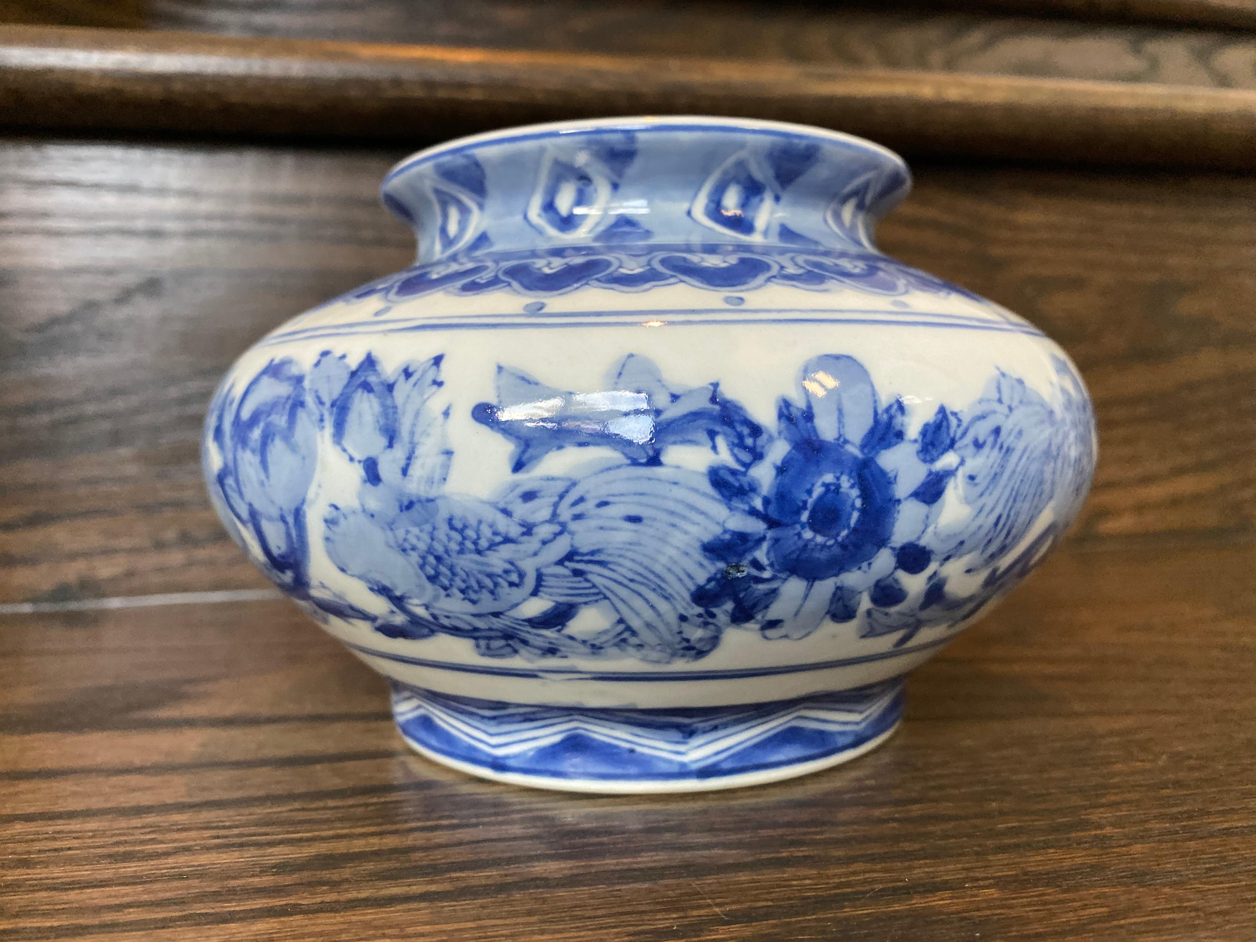 Porcelain Vintage Chinoiserie Blue and White Vase For Sale