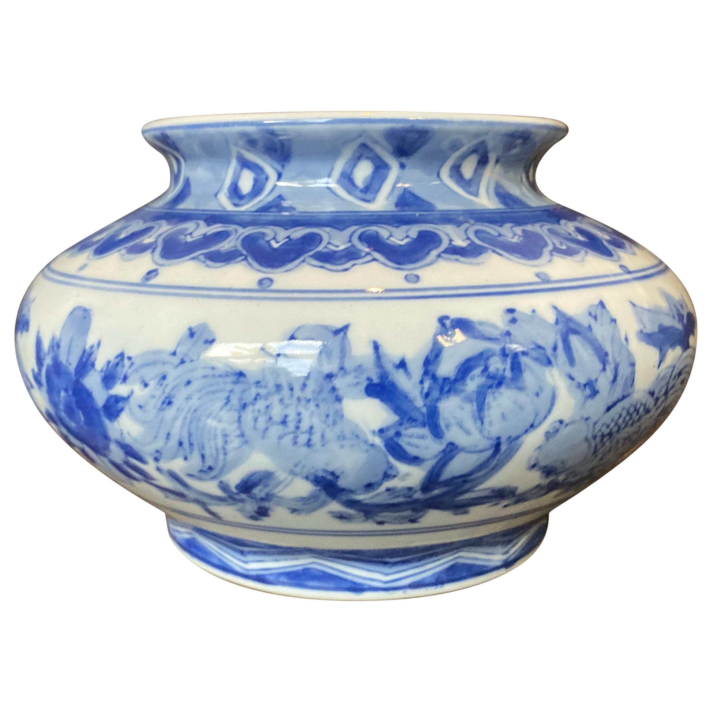 Vintage Chinoiserie Blue and White Vase For Sale