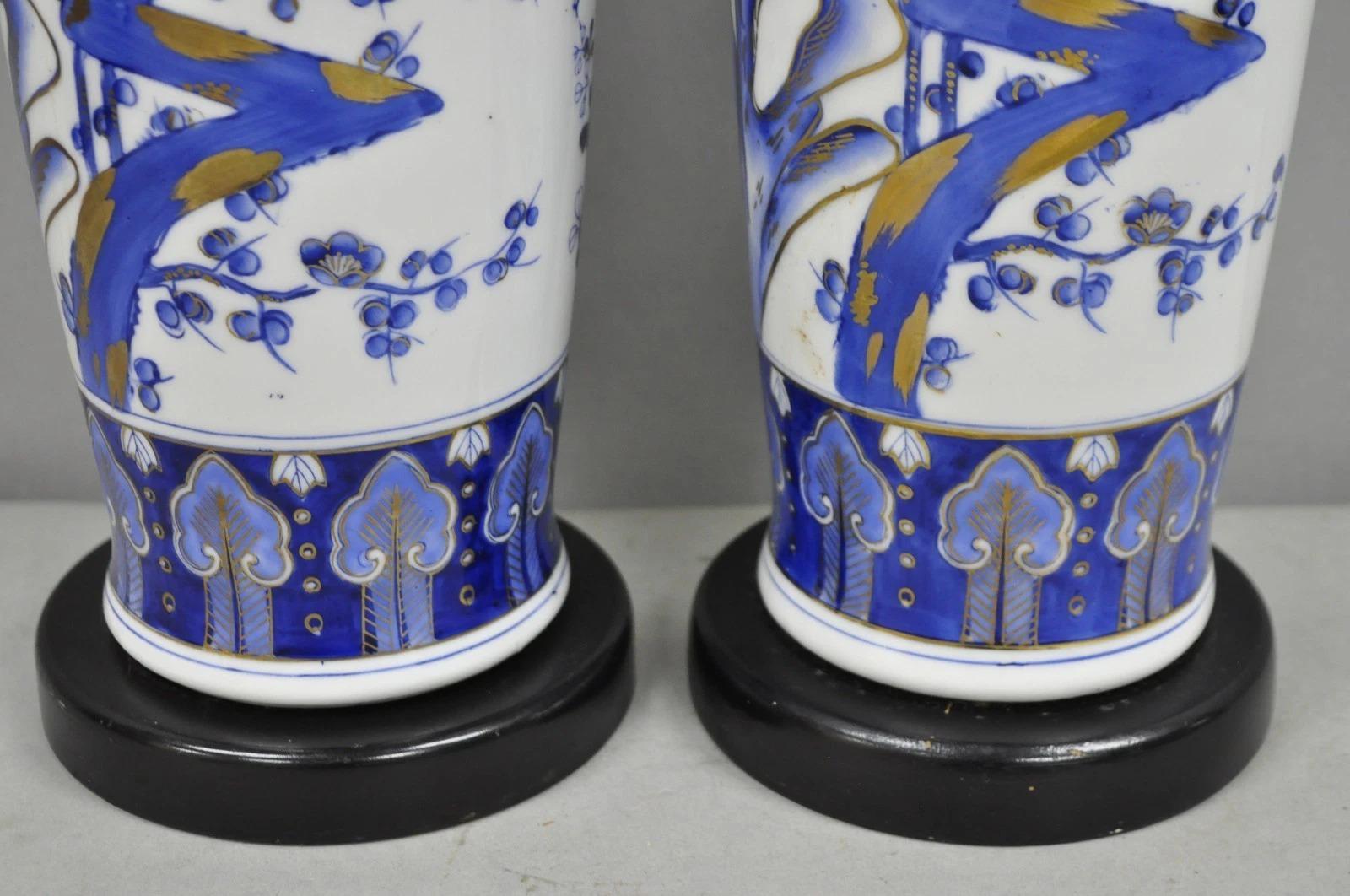 20th Century Vintage Chinoiserie Blue White Porcelain Bird & Plum Blossom Table Lamp - a Pair For Sale