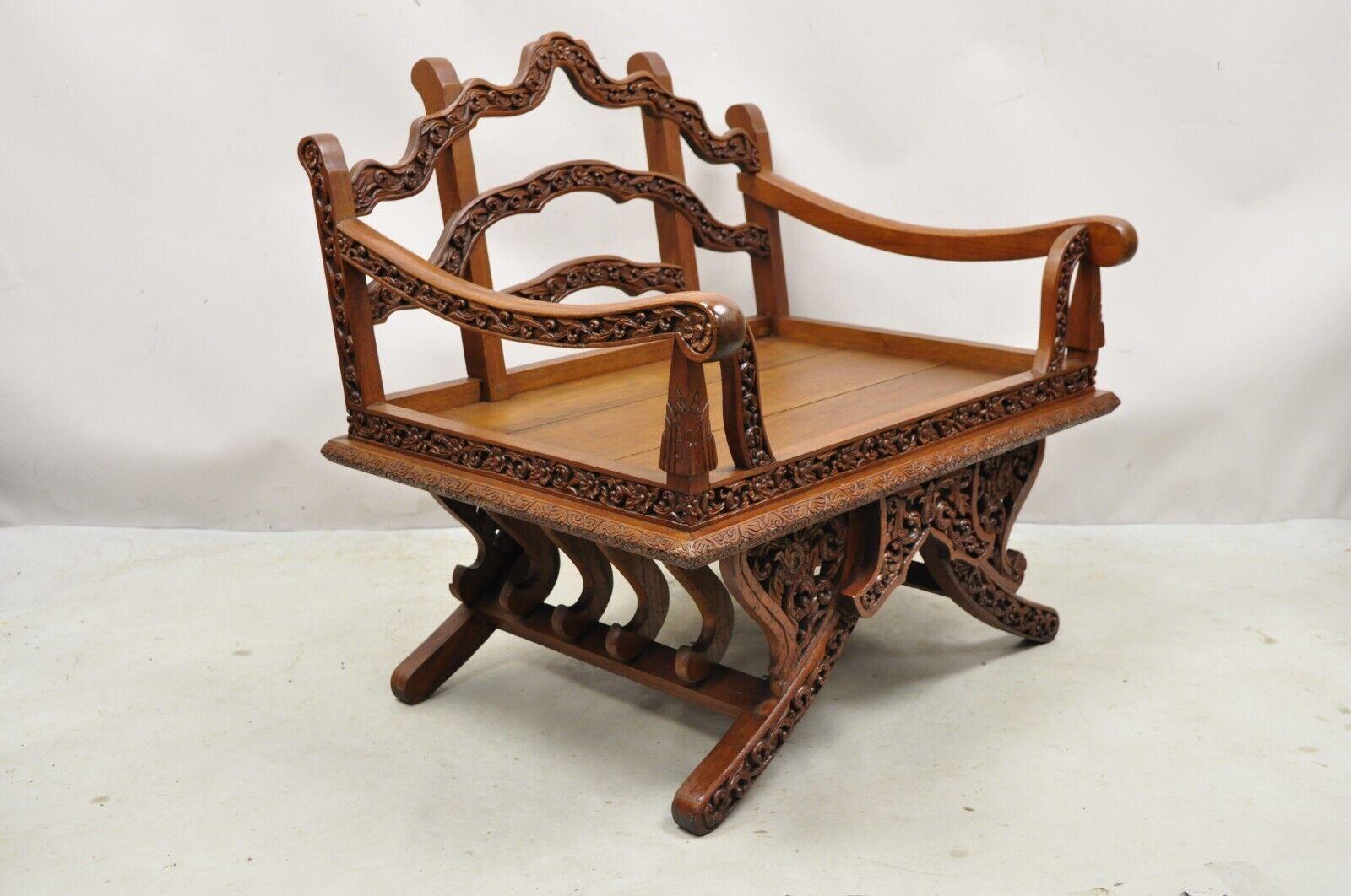 Vintage Chinoiserie Carved Teak Wood Howdah Elephant Saddle Accent Chair. Item features solid wood construction, nicely carved details, very nice vintage item, great style and form. Circa Late 20th Century. Measurements: 33.25