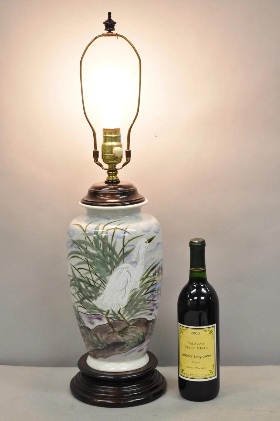 Vintage Chinoiserie Chinese Porcelain Jardiniere Table Lamp with Hand Painted Crane Bird and Dimmer Switch. Circa Late 20th Century. Measurements: 27.5