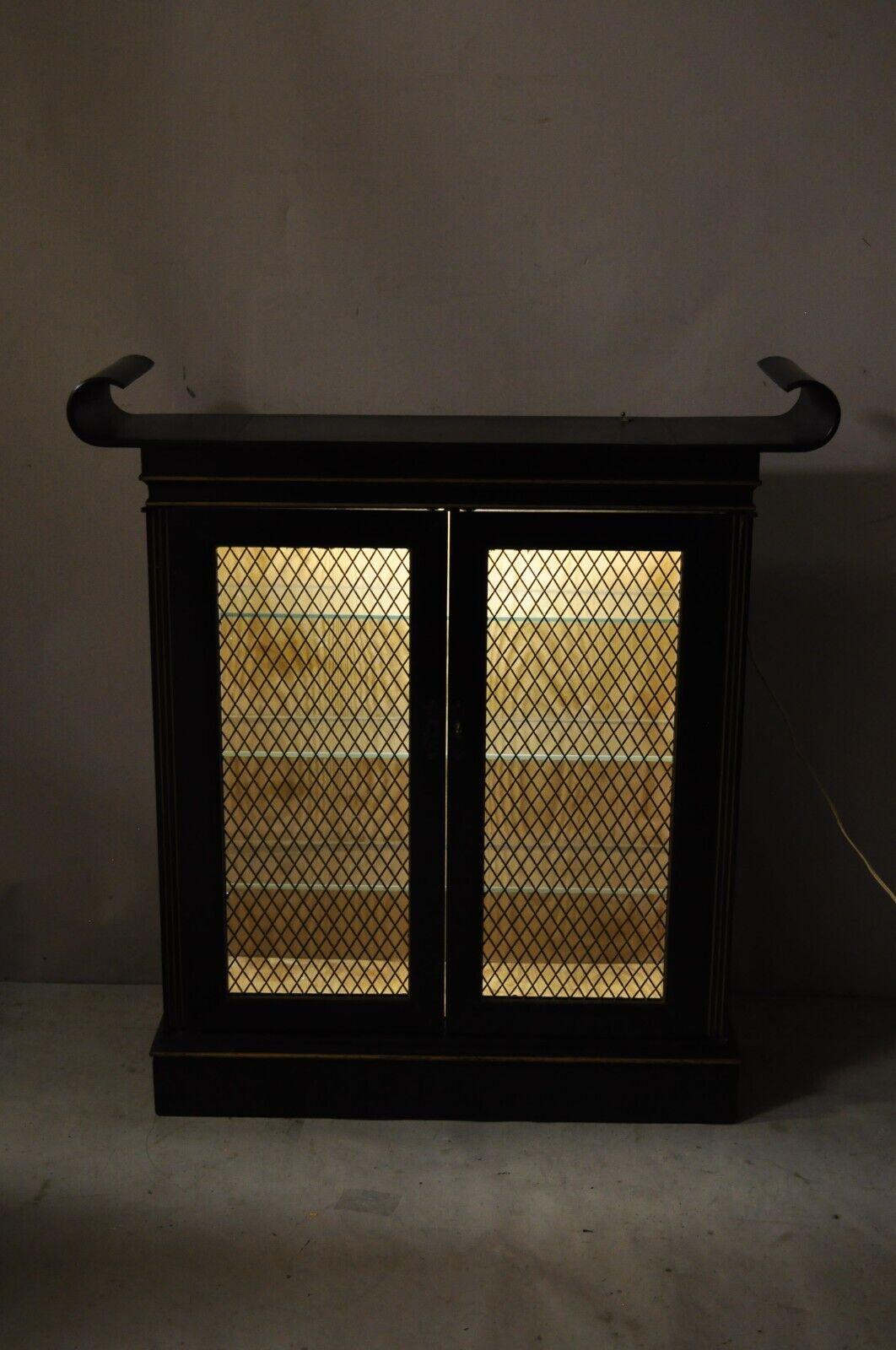 Vintage Chinoiserie ebonized black lacquer lighted pagoda display cabinet Curio. Item features a nice small size, black lacquer finish, bentwood 