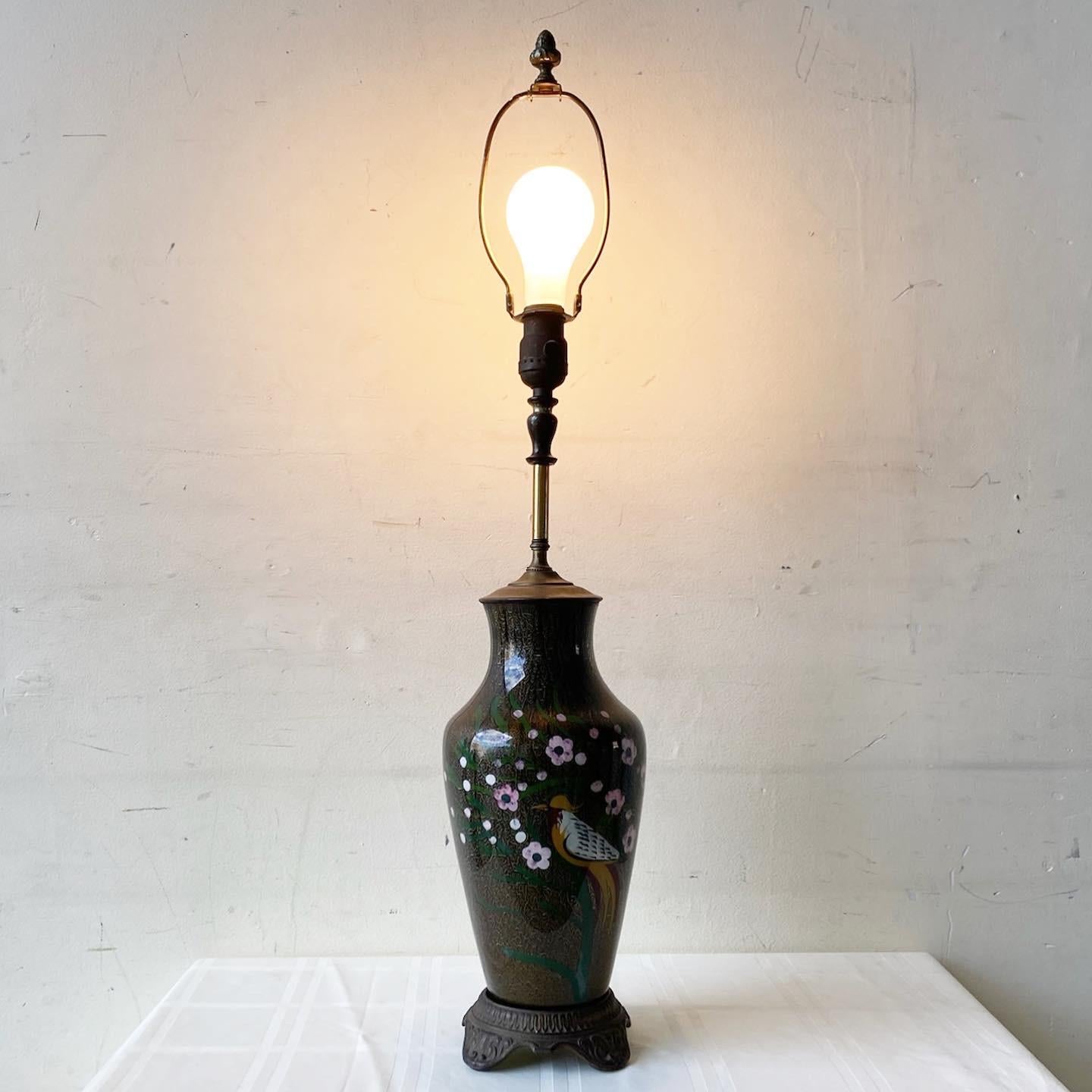Amazing vintage asian table lamp. Features a hand painted porcelain body with brass accents.