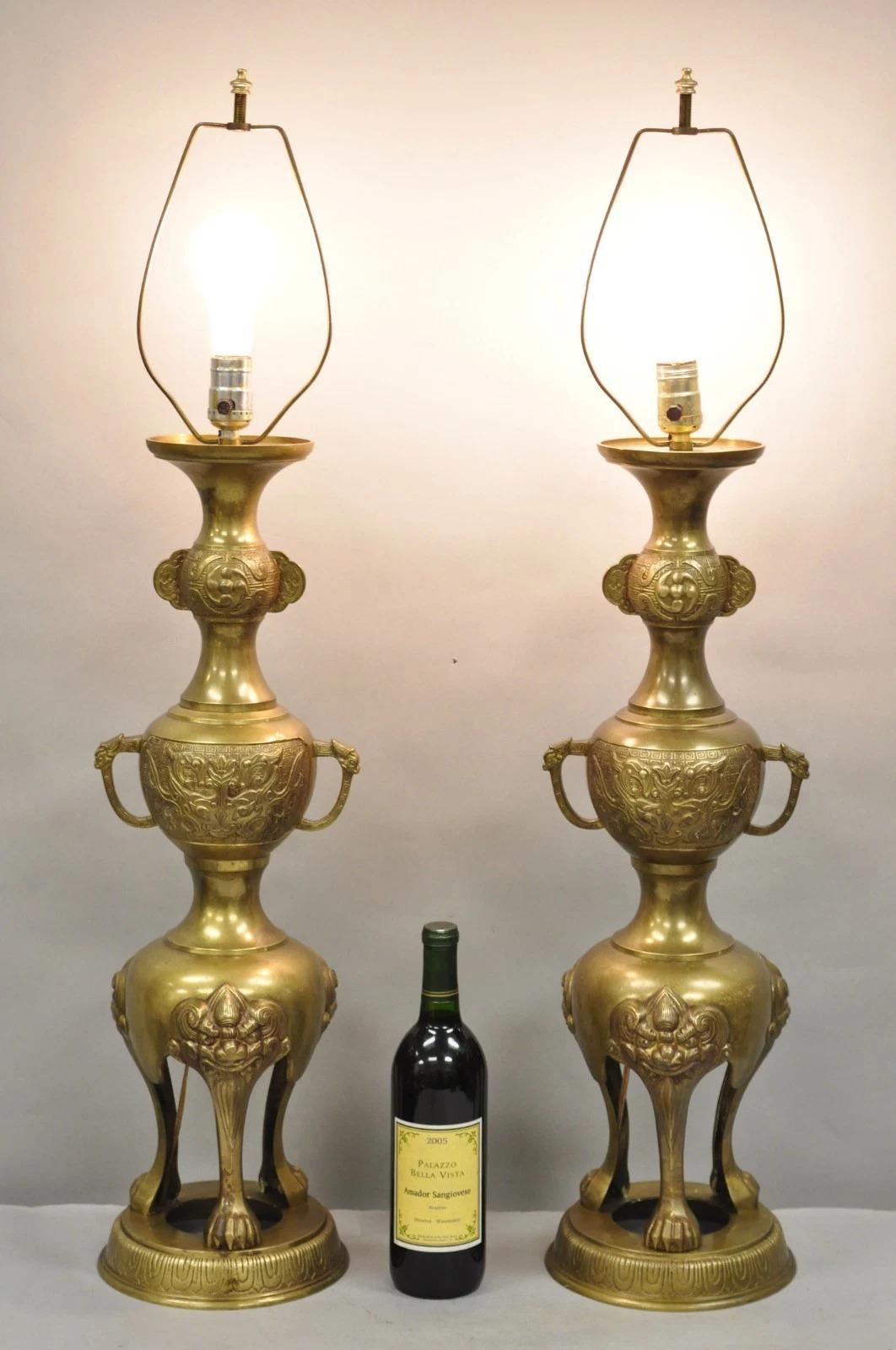 Vintage Chinoiserie James Mont Style Bronze Chinese Foo Dog Figural Table Lamps (B) - a Pair. Circa Mid 20th Century. Measurements: 37