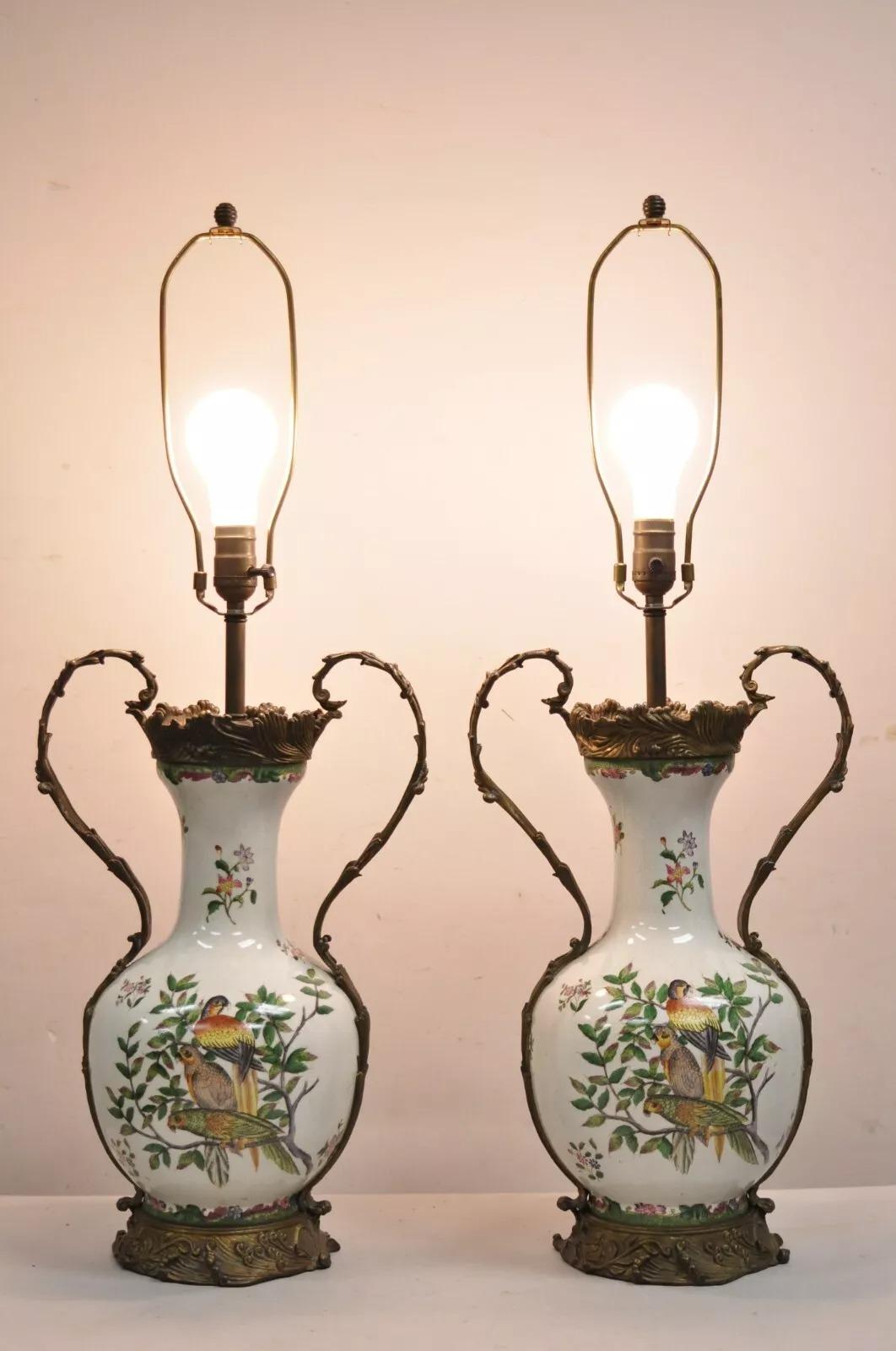 Vintage Chinoiserie Porcelain & Bronze French Louis XV Style Bird and Flower Painted Vase Form Table Lamps - a Pair. Circa Late 20th Century. Measurements: 33