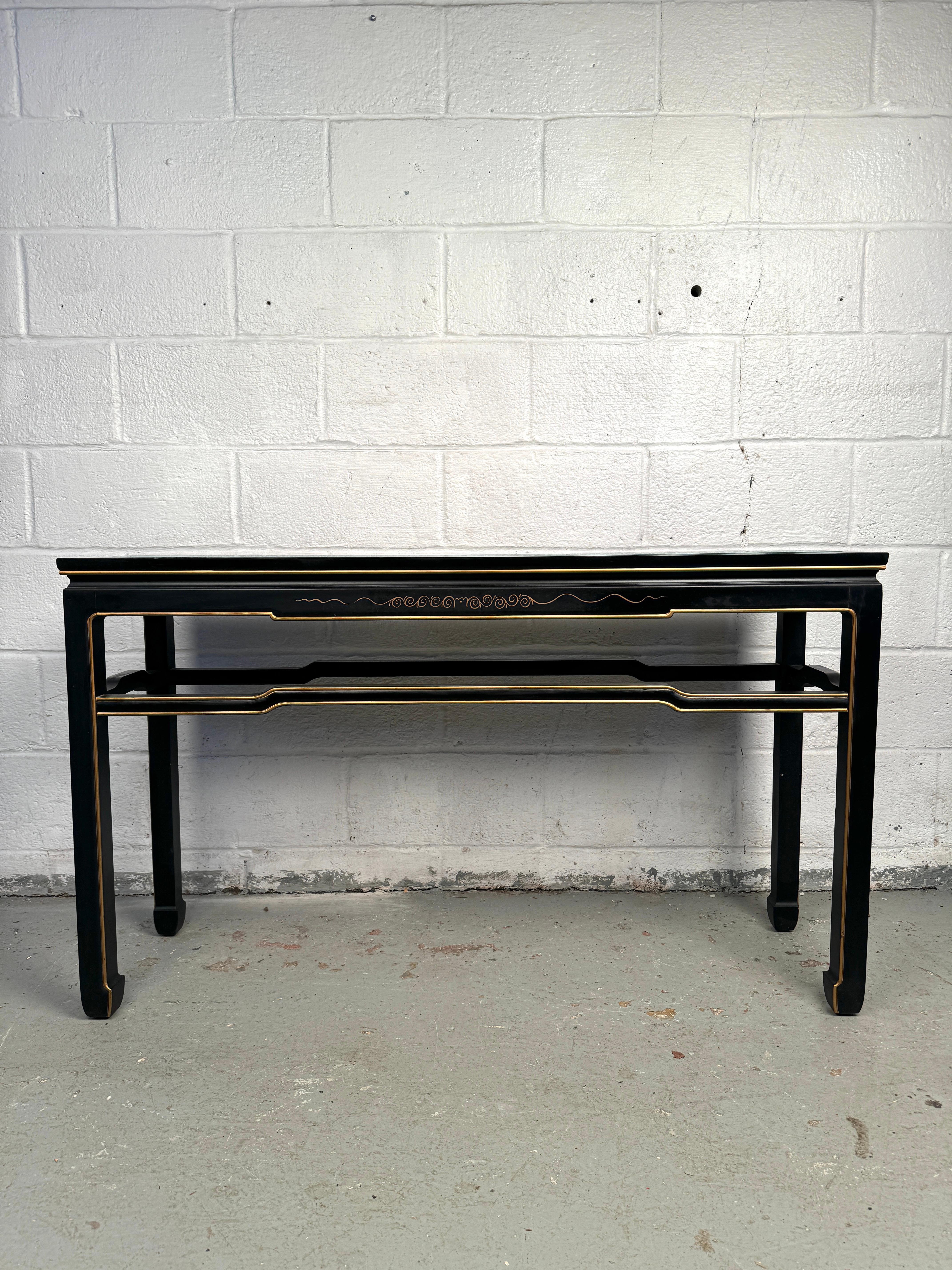 Add timeless elegance to your space with this exquisite vintage chinoiserie console, showcasing classic Oriental design elements and intricate hand-painted detailing. Crafted with artistic finesse, this piece features richly decorated panels with