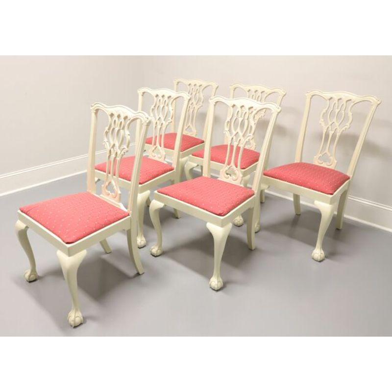 A set of six dining side chairs in the Chippendale style, unbranded, similar quality to Hickory Chair. Solid Mahogany with carved back splat, fabric upholstered seat, cabriole legs and ball in claw feet. Newly painted cream for an updated look. Made