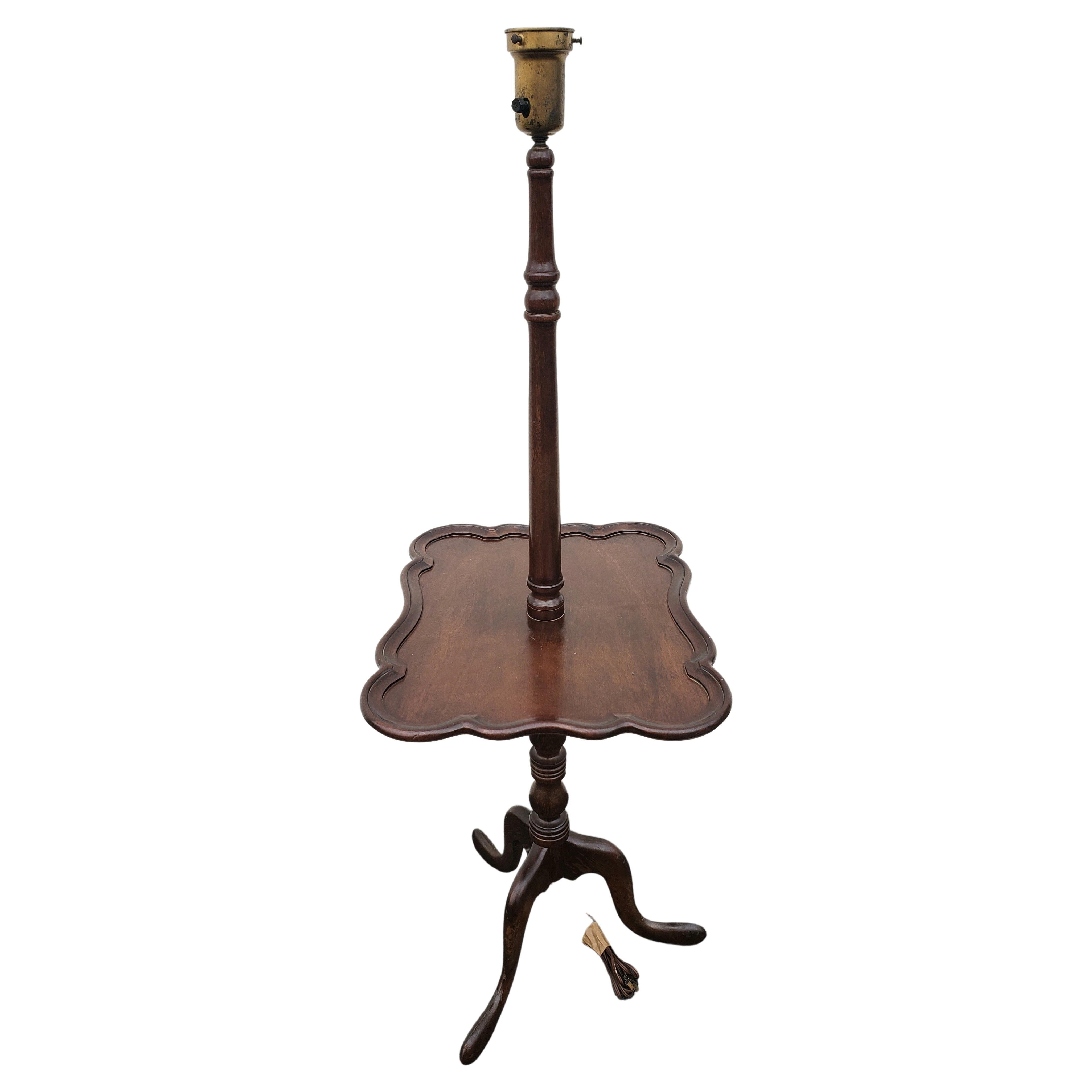 Very rare Vintage Chippendale mahogany torchiere floor lamp table, Circa 1940s. Mahogany Tripod pedestal base.
Measures 20