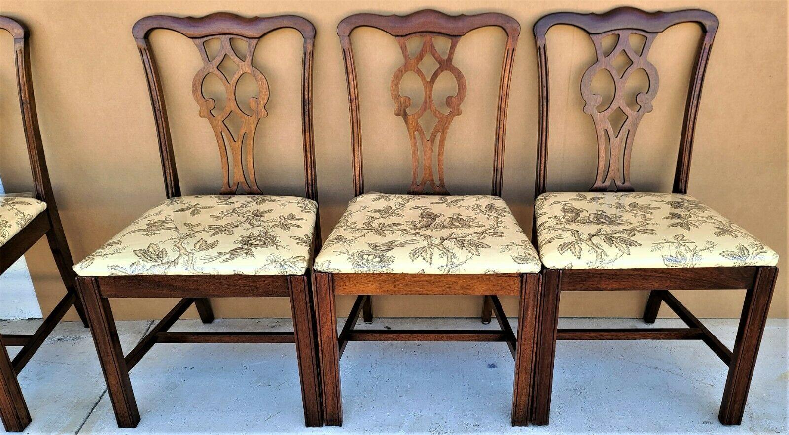 Offering one of our recent palm beach estate fine furniture acquisitions of A 
Vintage Chippendale solid mahogany dining chairs by Statesville Chair Co - Set of 5

With Asian-themed fabric protected by plastic.

Approximate Measurements in