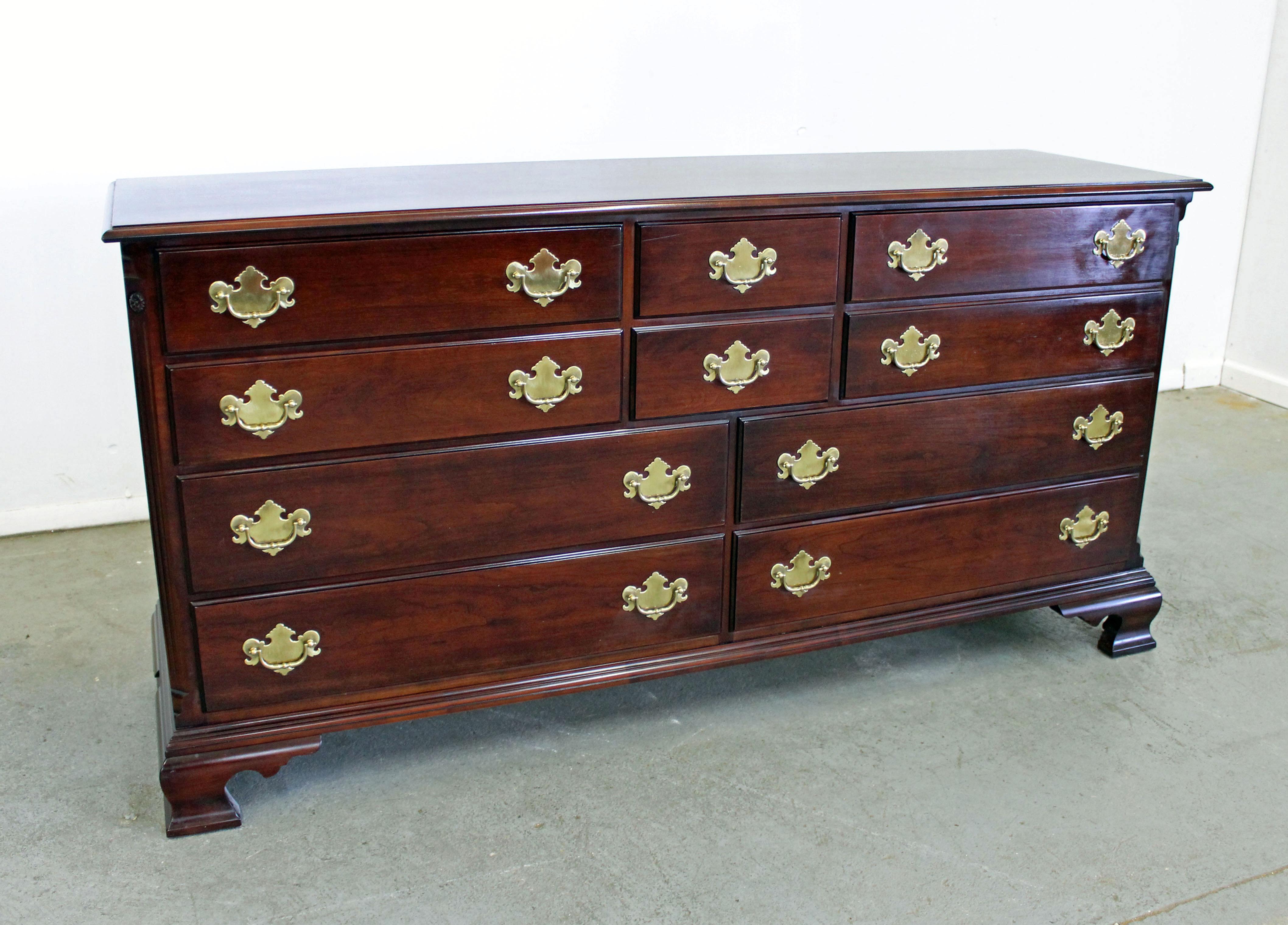 Offered is a Chippendale cherry dresser by Statton old town. Features 10 dovetailed drawers with gold tone pulls. It is in good condition, shows some signs of wear (age wear, wear on pulls, surface scratches- see photos), but nothing overly
