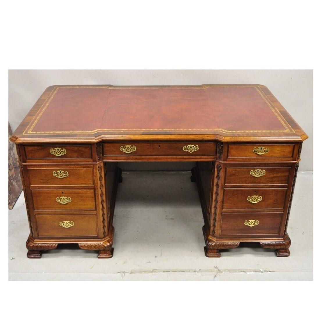 Vintage Chippendale Style Double Sided Leather Top Executive Partners Desk. Item featured separates in 3 parts for ease of transport, large impressive size, double sided partners desk form with 7 dovetailed drawers to one side, and the opposite side