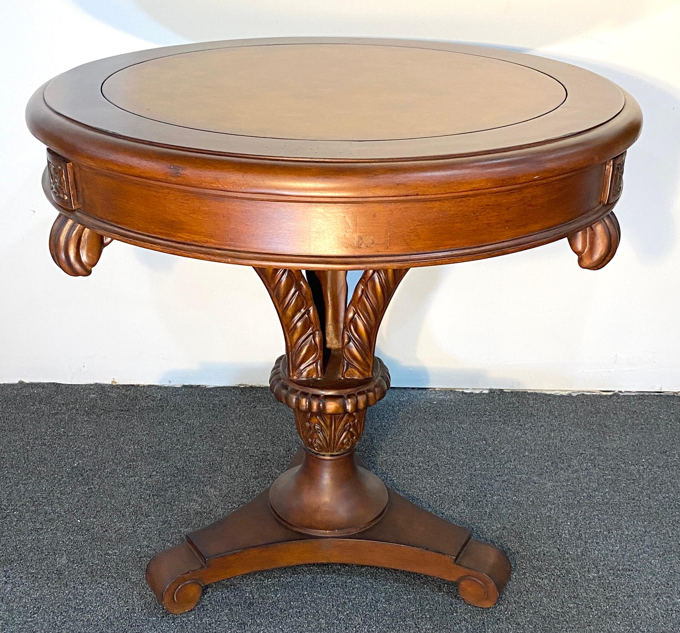 A very good quality Chippendale style center, end or side table constructed of mahogany. This side table is very well made and embodies traditional Victorian details. The inlaid leather on the top makes this a great center table to display your