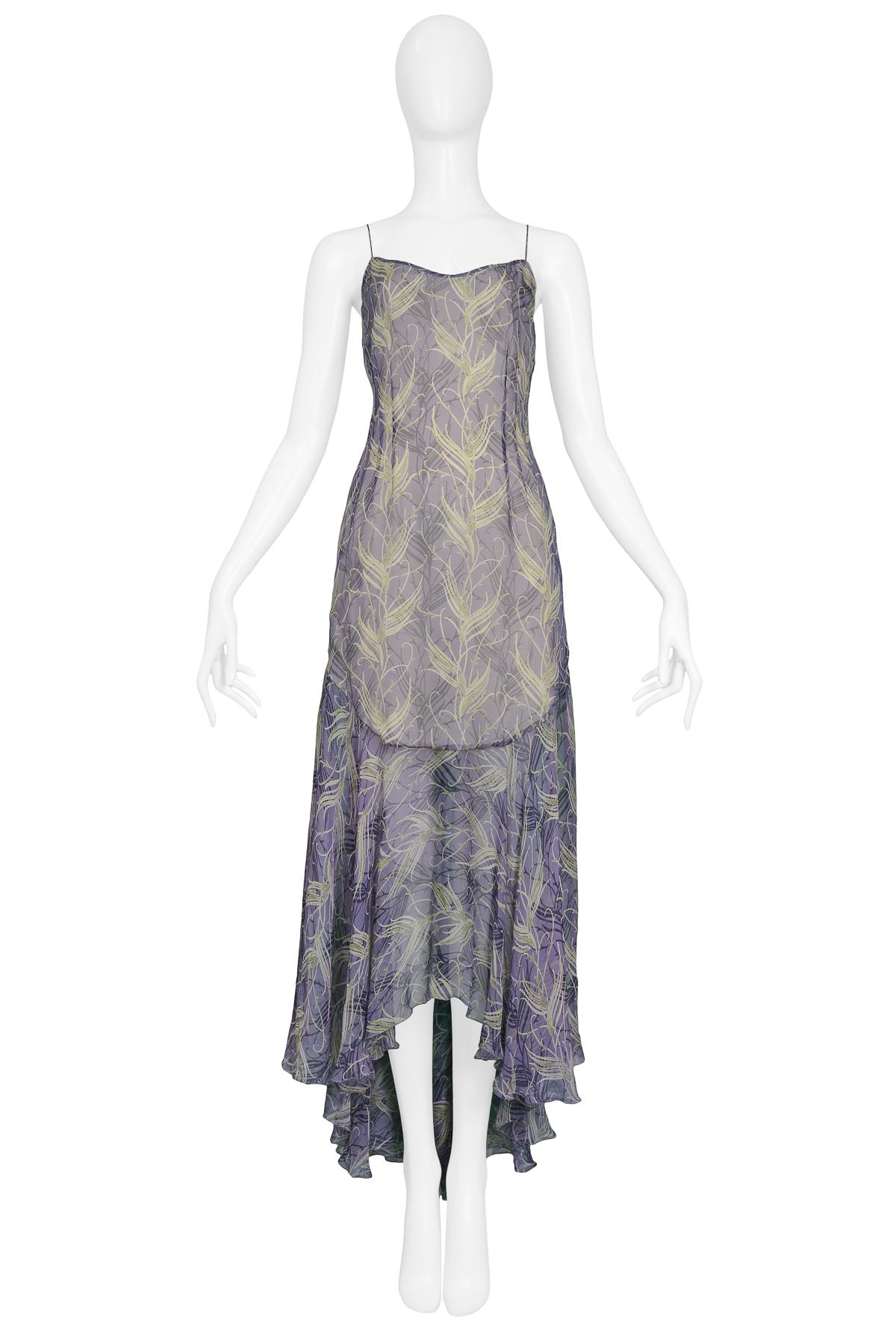 Vintage Stella McCartney for Chloe blue silk slip dress featuring a pastel green abstract feather print, a darted bodice, drop waist and spaghetti straps. Runway piece from the 1999 Spring / Summer Collection.

Excellent Vintage Condition.

No Size