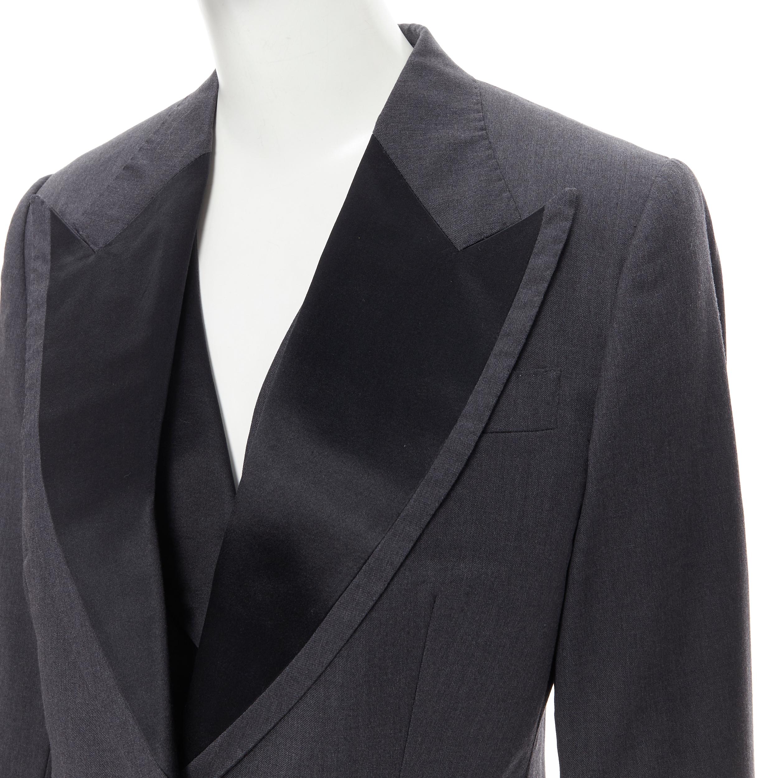 vintage CHLOE grey wool 3-pc tuxedo blazer vest pant suit set 
Reference: GIYG/A00054 
Brand: Chloe 
Designer: Stella McCartney 
Material: Wool 
Color: Grey 
Pattern: Solid 
Closure: Button 
Extra Detail: This blazer comes with the complimentary