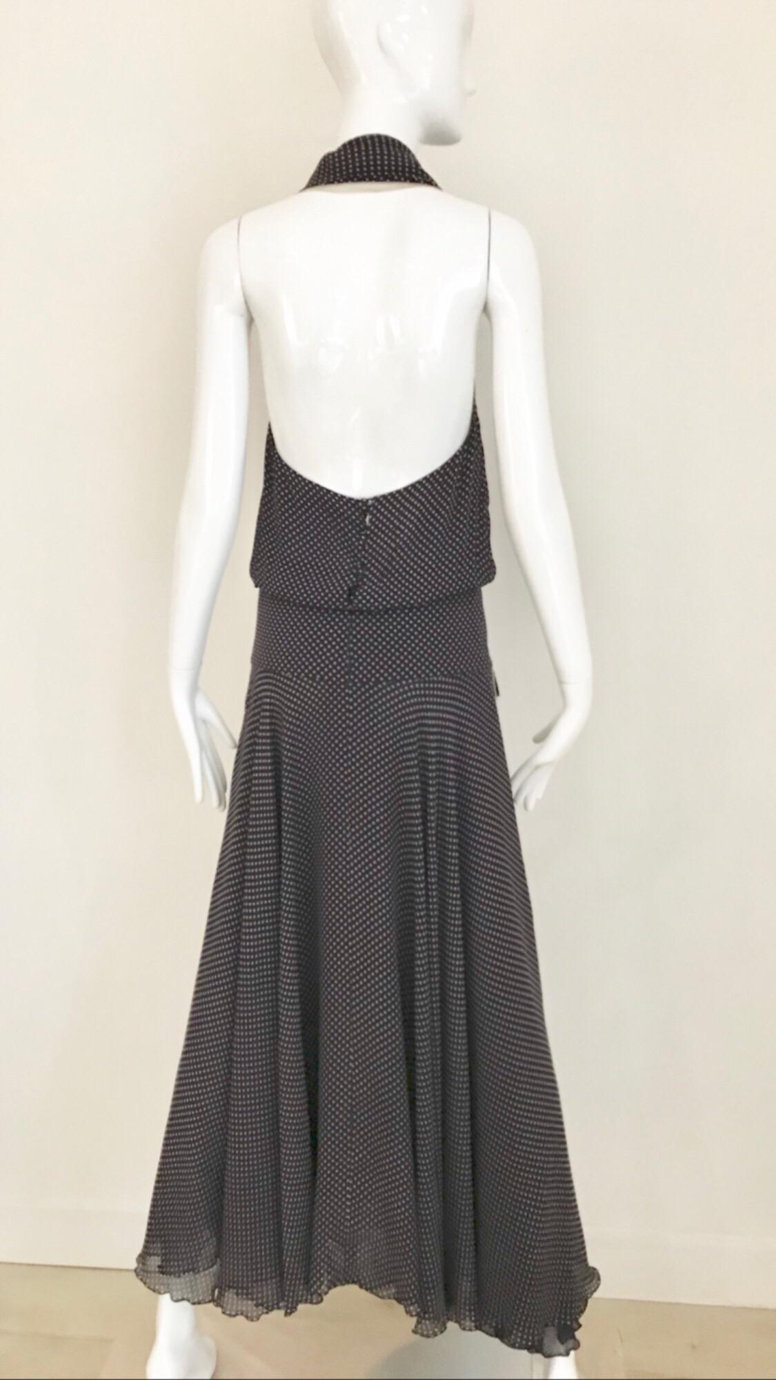 Vintage Chloe Navy blue and small white polkadot silk halter dress with collar and faux pockets.
Size: Small to Med
Bust: 36 inches/ Waist: 30 inches/ Hip: 36 inches. Dress length: 54 inches