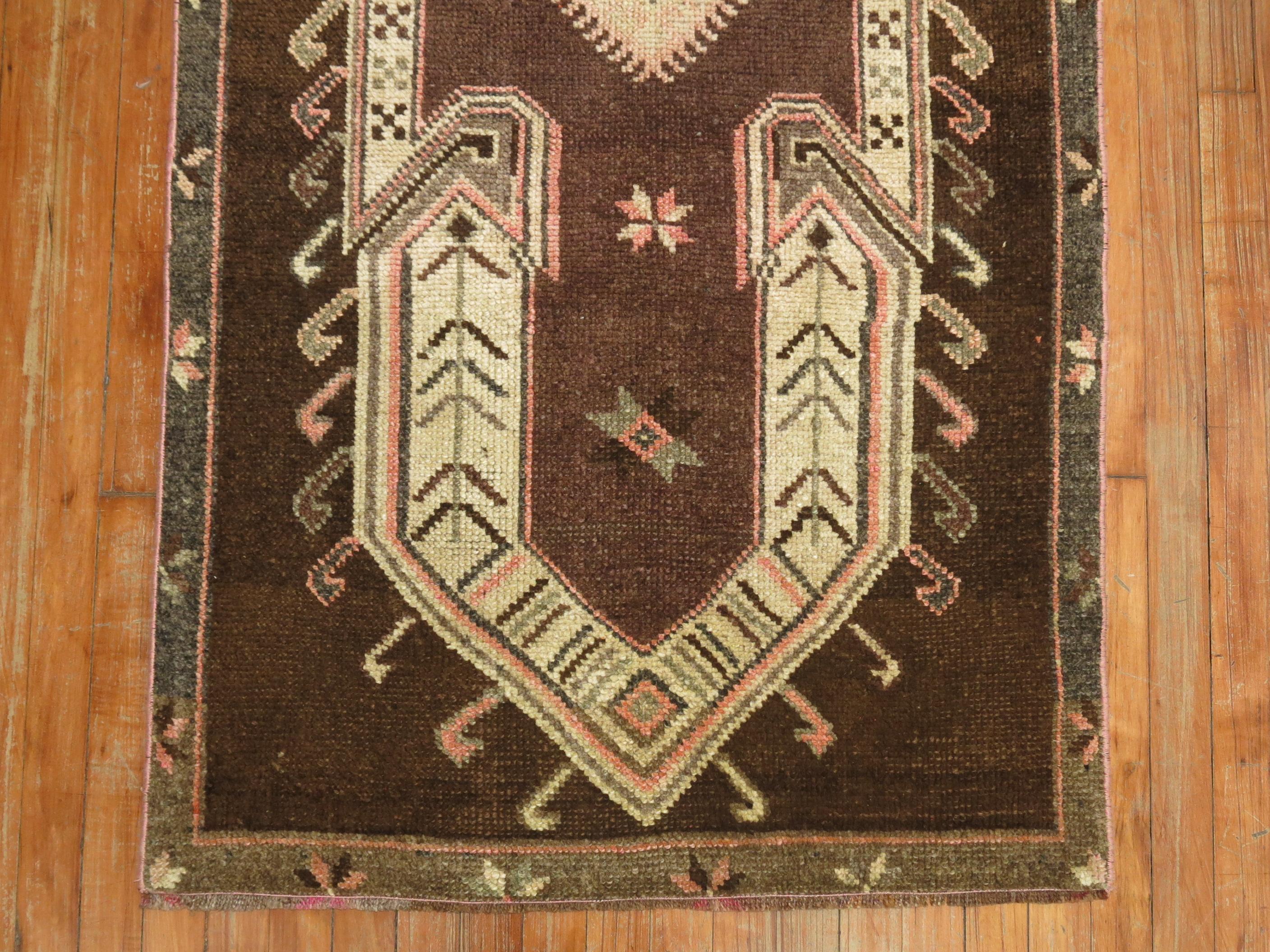 A mid-20th century tribal Turkish scatter size rug.

2'11