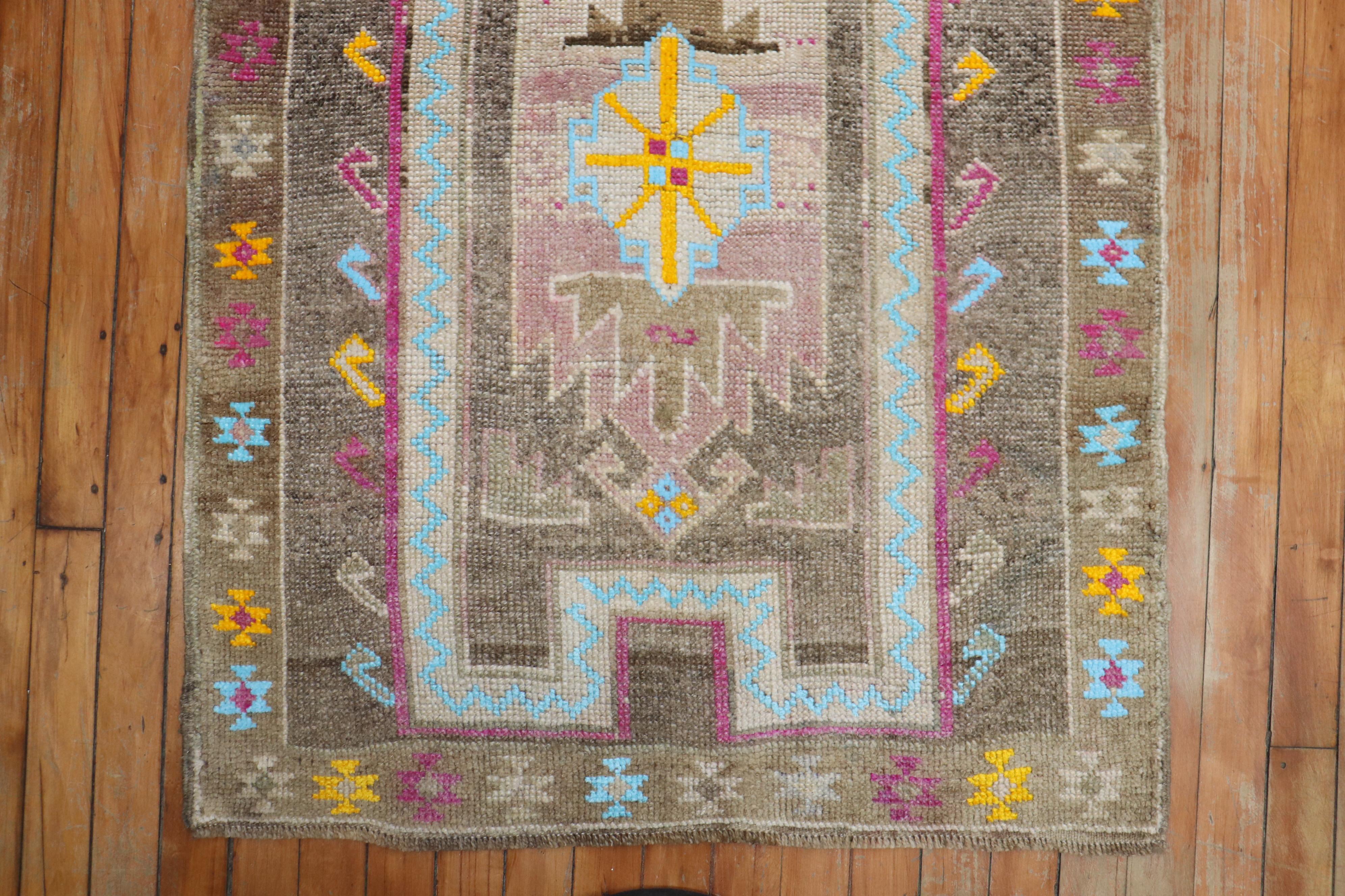 one of a kind eclectic turkish prayer rug from the kars region. We added some colorful wool to add some color pop. Oriignally from the 1950's

Measures: 2'8