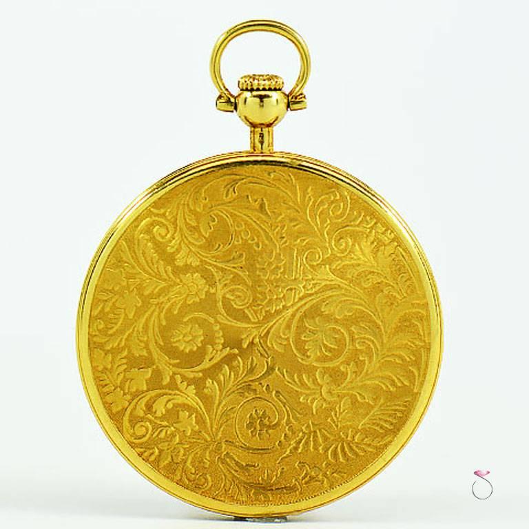 Magnificent vintage Chopard 18K yellow gold Pocket Watch, 42 mm model 3004. This gorgeous open face pocket watch features a beautifully engraved gold dial & case back. The dial has black enameled Roman numeral hour markers & hands. The case measures