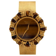 Montre Vintage Chopard œil de tigre en or jaune 18k