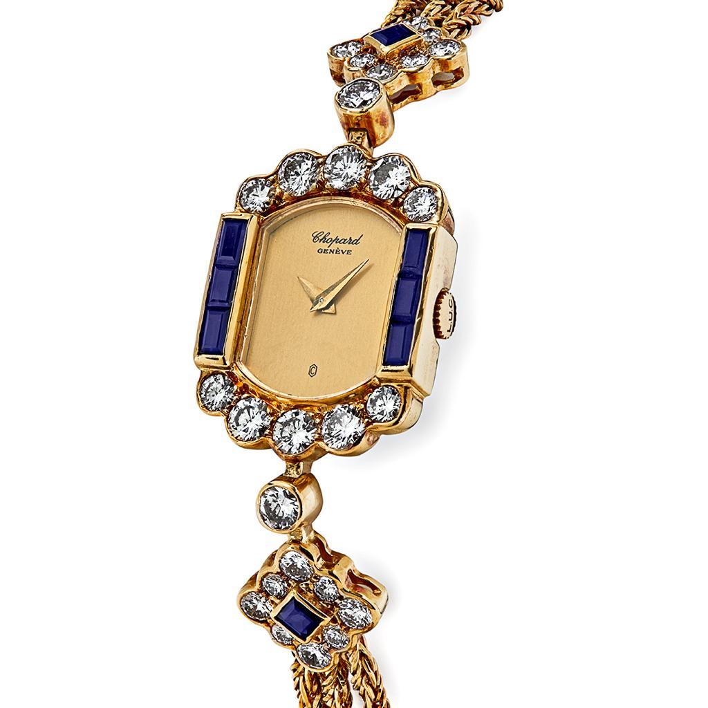 Vintage Chopard Yellow Gold Diamond and Sapphire Watch 

Movement:Quartz
Case Material:Yellow Gold
Bracelet material:Yellow Gold
Condition:Vintage
Year:Unknown

*This piece does not come with a box or papers.

Please contact us for more information.