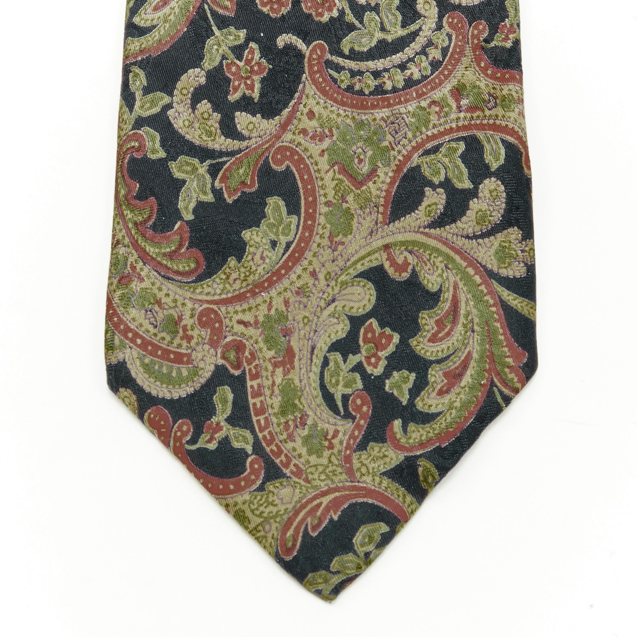 vintage CHRISTIAN DIOR 100% silk red blue oriental paisley print tie 
Reference: PRTI/A00003 
Brand: Dior Monsieur 
Material: Silk 
Color: Navy 
Pattern: Floral 
Extra Detail: 100% silk. 
Made in: Italy 

CONDITION: 
Condition: Very good, this item