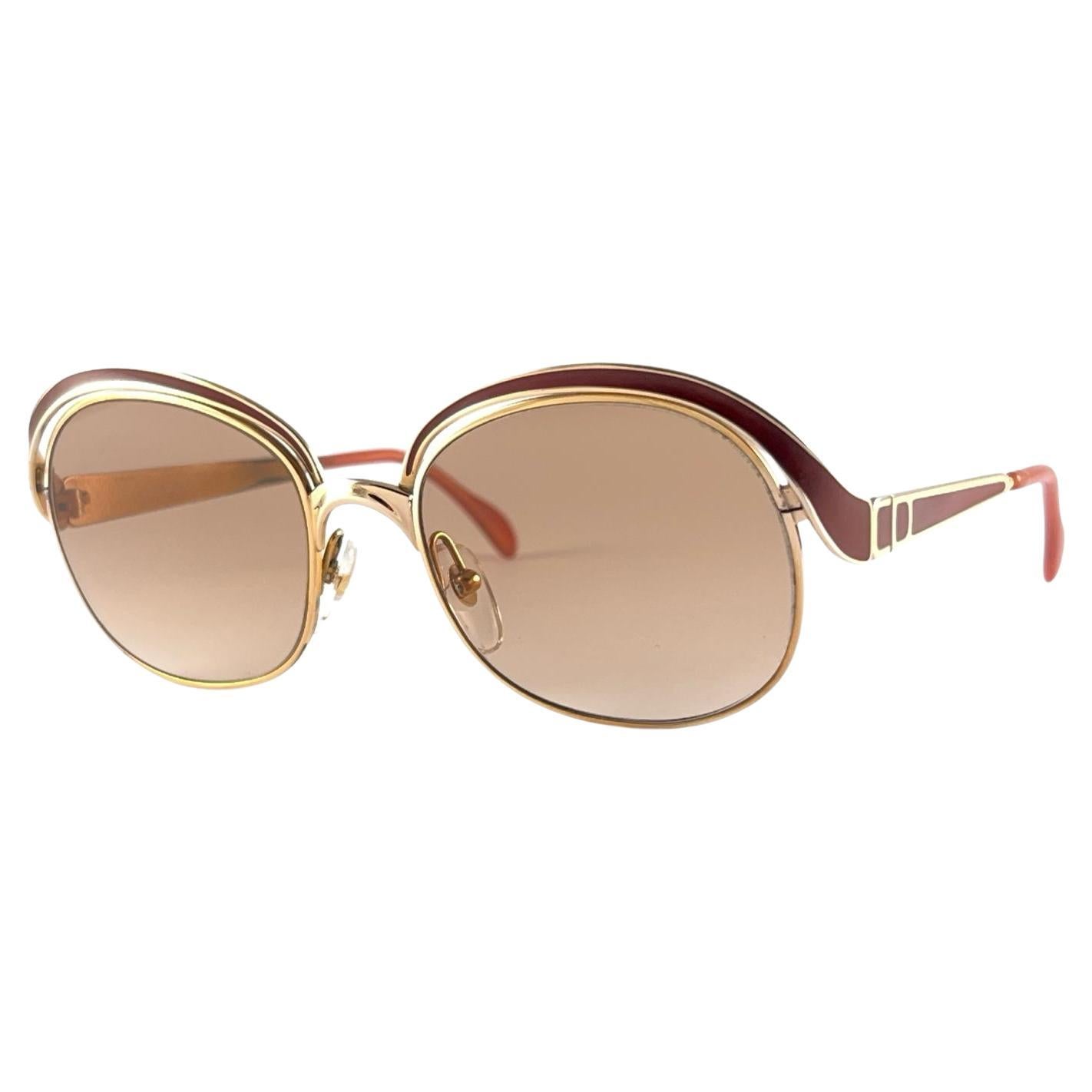 Lunettes de soleil vintage Christian Dior 2037 43 or et acajou 1970's Autriche en vente