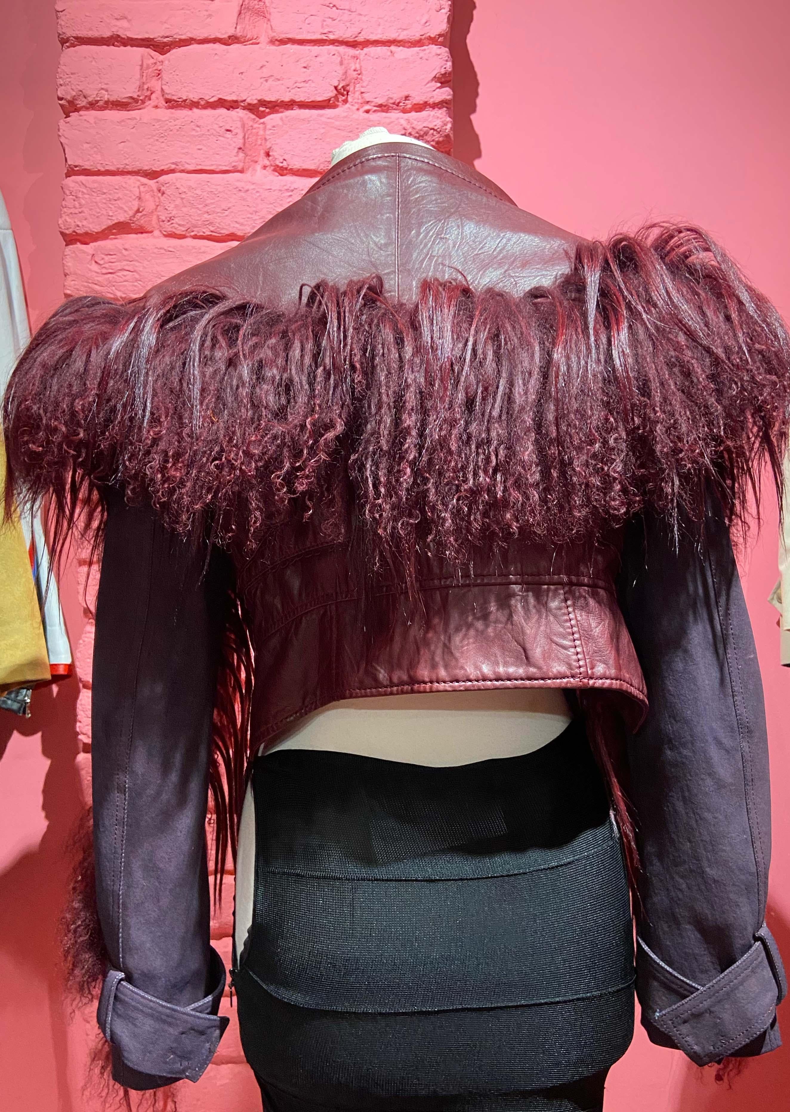 Christian Dior by John Galliano A/W 2006 burgundy leather fur trim short bolero. Features yack fur trim details on arms and all over the collar. Front button for closure.  Look 50 on the runway. In excellent vintage condition.

Brand: Christian