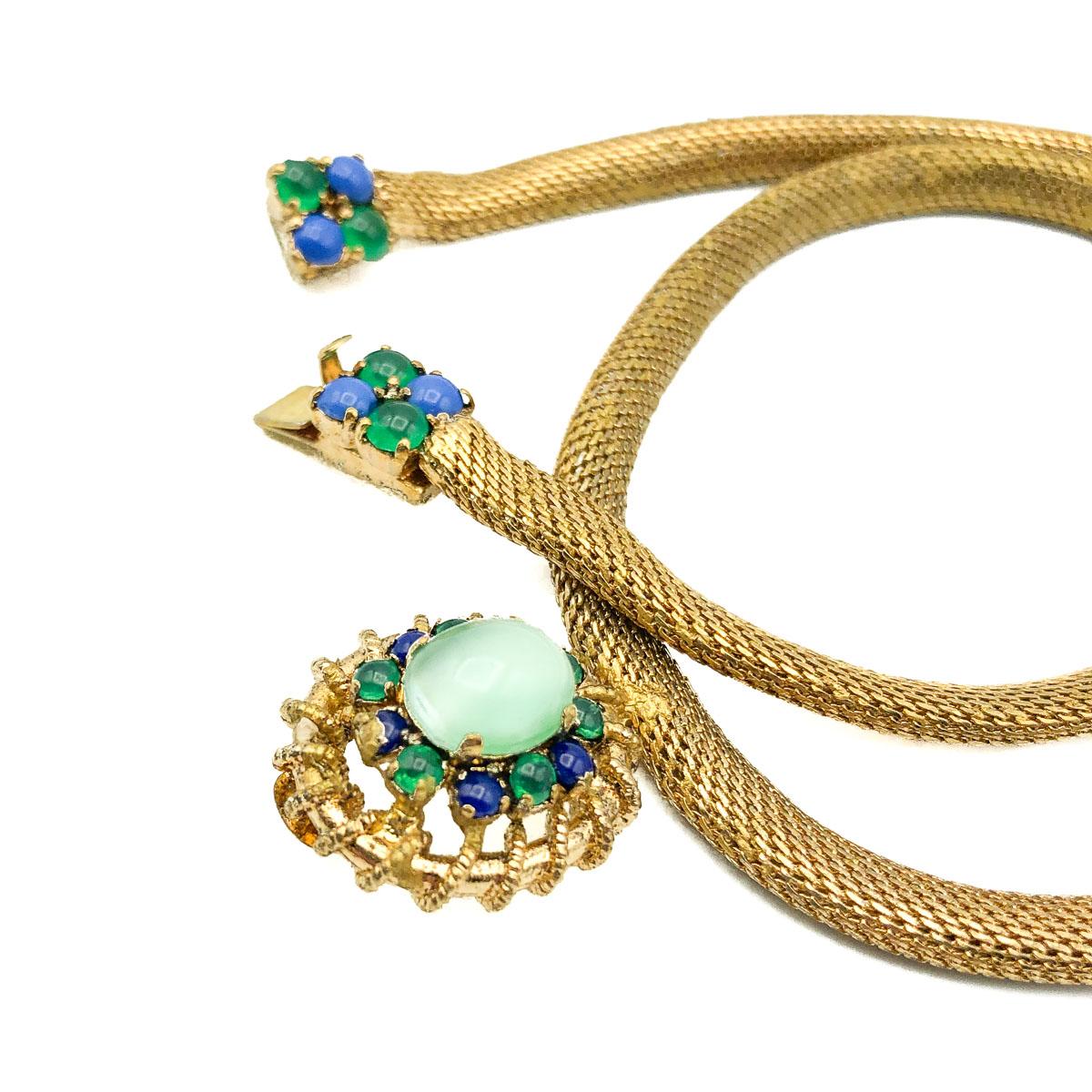 Vintage Dior All at Sea Collar. Crafted in gold plated metal and set with glass cabochon stones in a variety of blues and greens; reminding us of the exotic colours of the sea. Good vintage condition, signed and dated, approx. 42cms. A delightful
