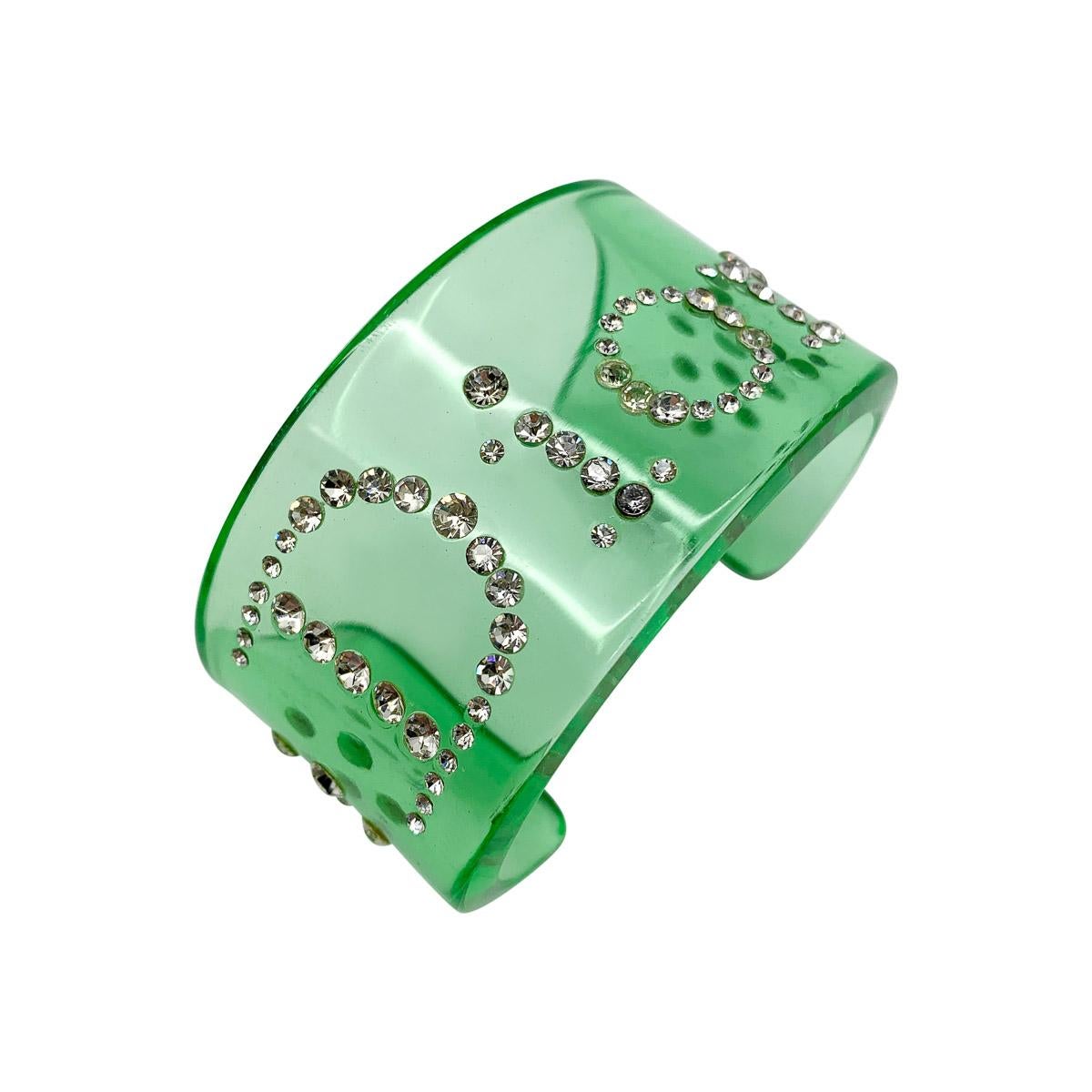 A Vintage Dior Apple Cuff from the Galliano era. Featuring a broad apple green lucite cuff studded with crystals spelling out the name of the iconic House of Dior.
With archive pieces from her own Dior collection displayed in London's highly