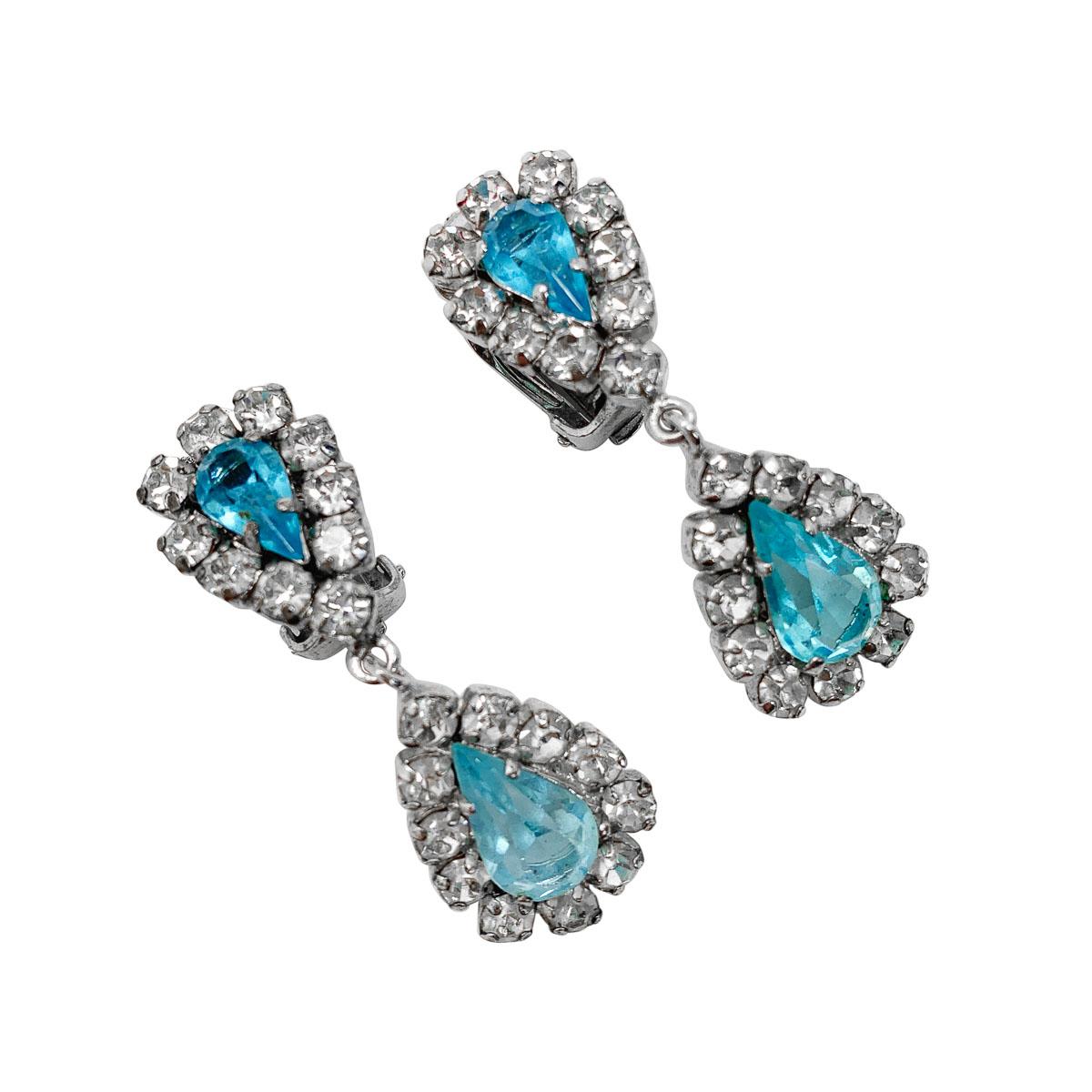 Delicate and feminine vintage Dior Aqua Earrings. Featuring beautiful aqua crystals in teardrop cuts with white chaton halos.
With archive pieces from her own Dior collection displayed in London's highly acclaimed Dior Designer of Dreams Exhibition,