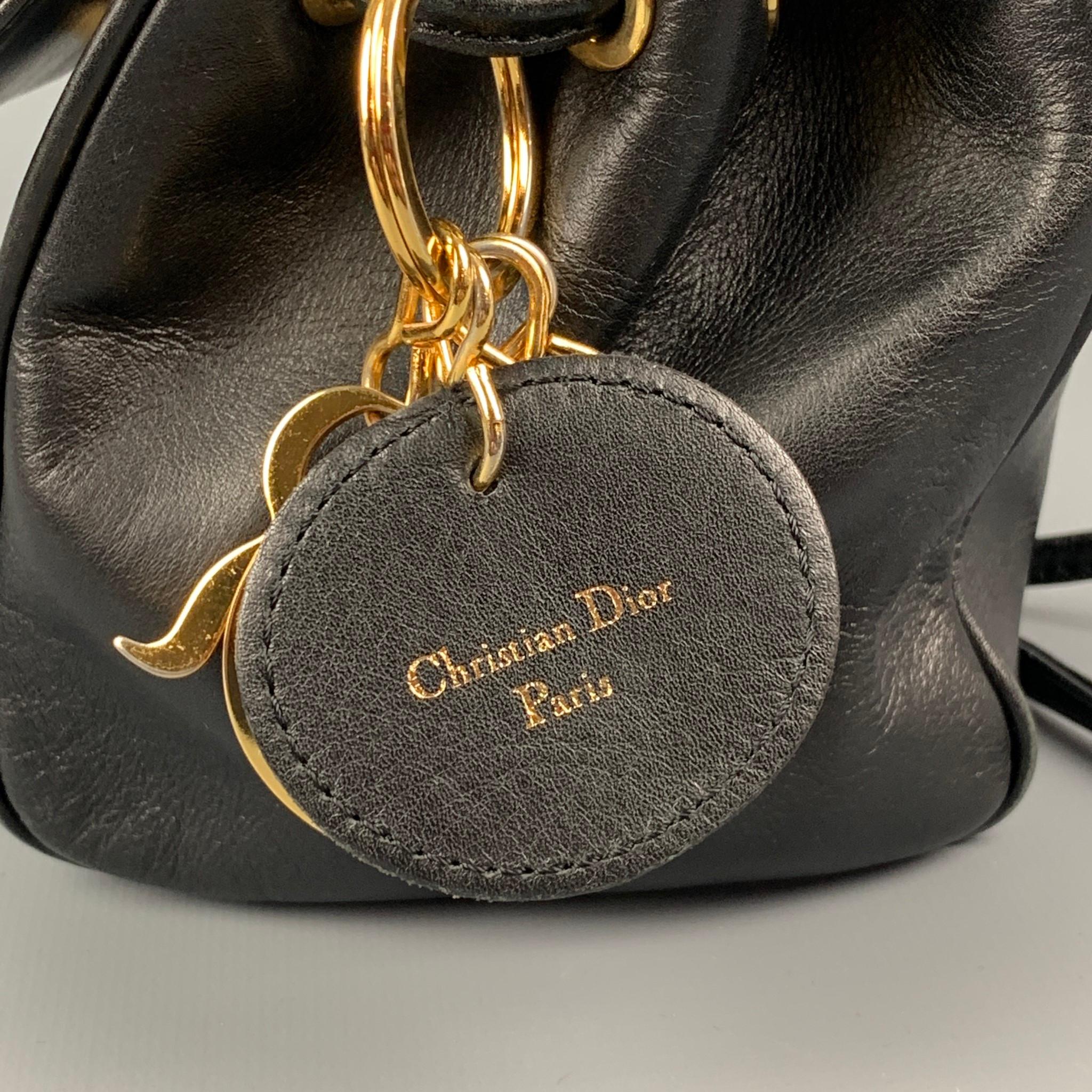 Vintage CHRISTIAN DIOR Black Leather Gold Charm Shoulder Bag Mini Handbag In Good Condition In San Francisco, CA