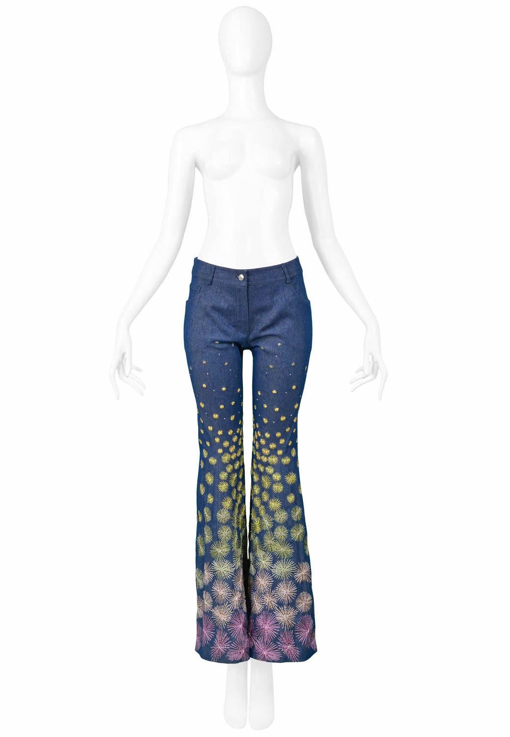 Vintage Christian Dior by John Galliano dark blue denim jeans featuring flared bottoms, multicolor heavily embroidered firework detail, and front pockets. From the 2002 Collection. 

Excellent Vintage Condition.

Size 40