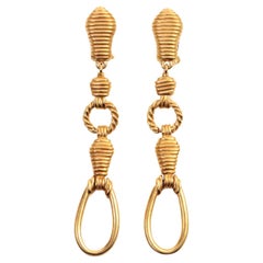 Pendientes largos de oro de la Boutique Vintage Christian Dior, alrededor de los años 80