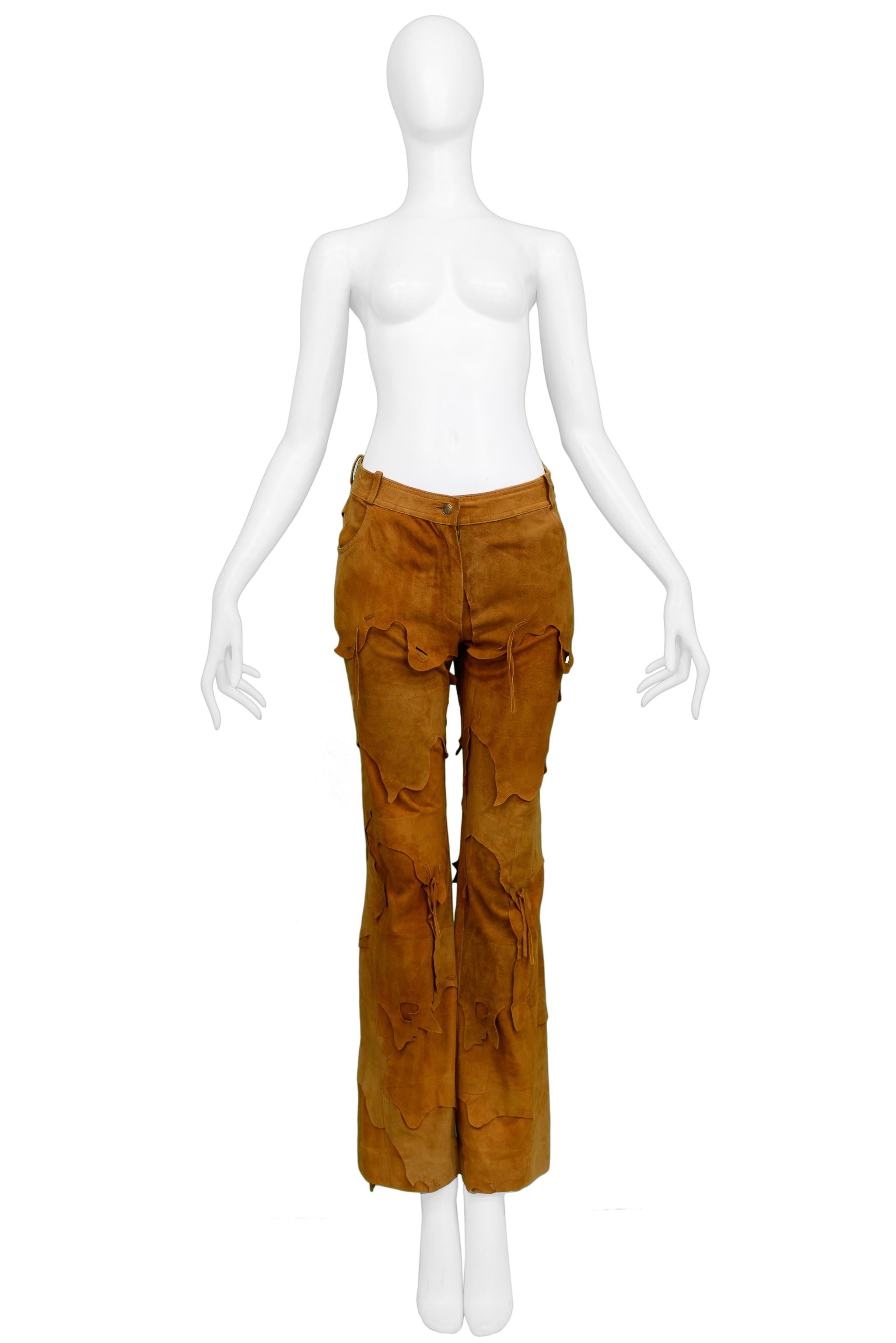 Resurrection Vintage is excited to offer a vintage Christian Dior by John Galliano brown goat suede leather pants featuring a metal snap waistband with belt loops, slightly boot cut silhouette, slit pockets, raw patchwork insets, and flat back with