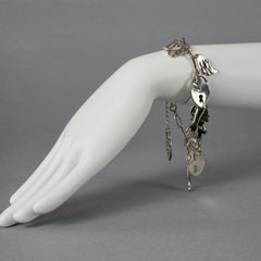 Vintage CHRISTIAN DIOR by GALLIANO Figural Charm Silver Bracelet